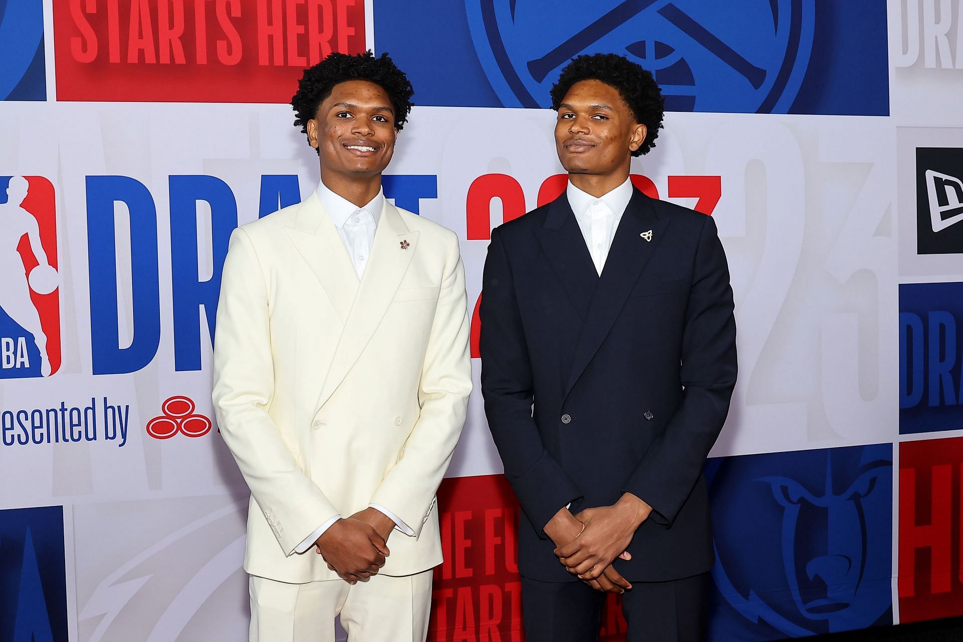 (L-R) Amen Thompson and Ausar Thompson arrive prior to the first round of the 2023 NBA draft