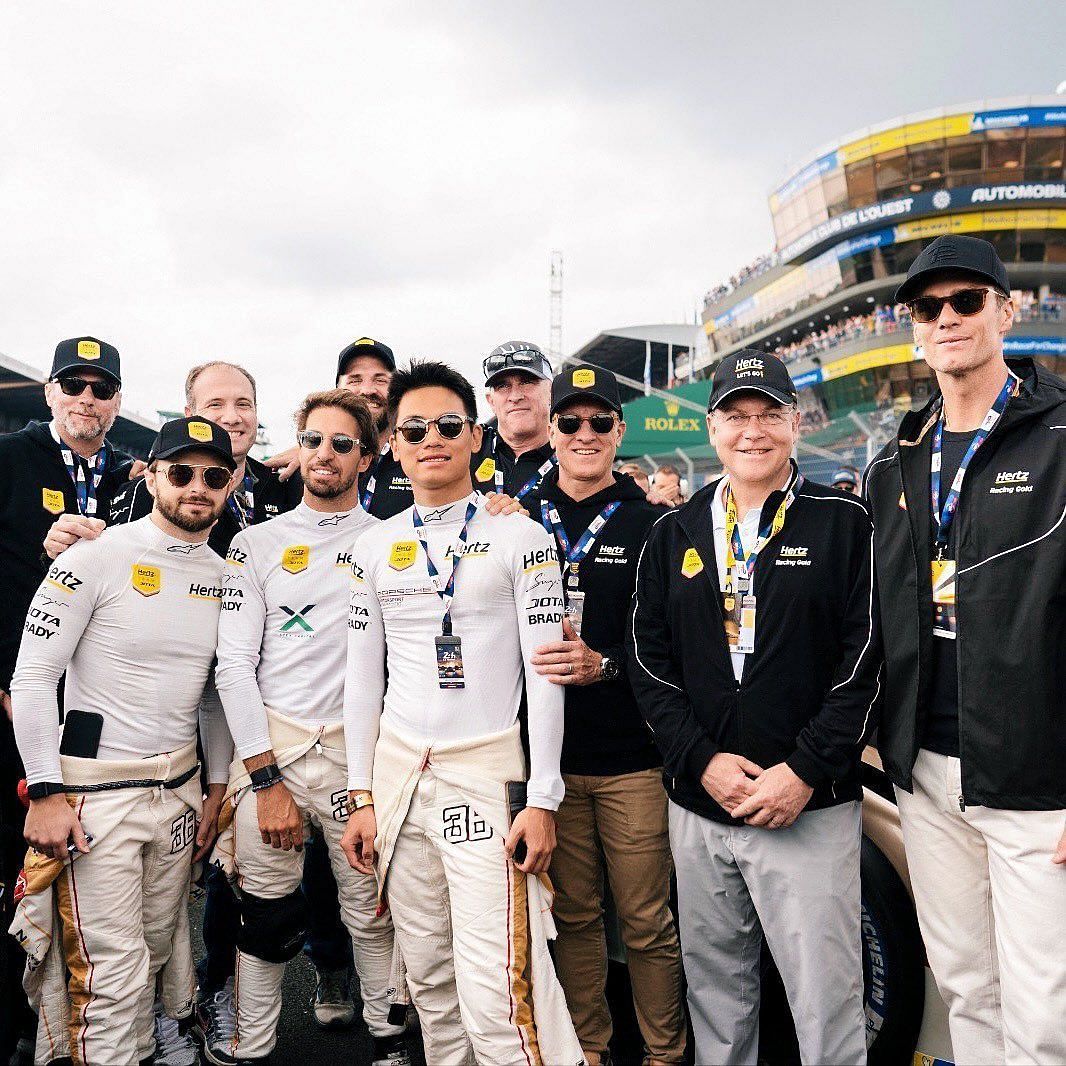 Brady pictured alongside the Hertz team