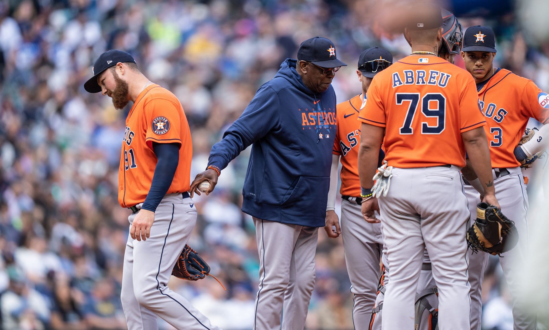Houston Astros manager Dusty Baker pulls pitcher Matt Gage during a meeting at the mound including Jeremy Pena and Jose Abreu at T-Mobile Park