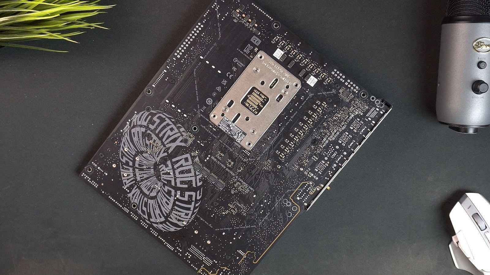 The back of the ROG Strix X670E motherboard (Image via Sportskeeda)