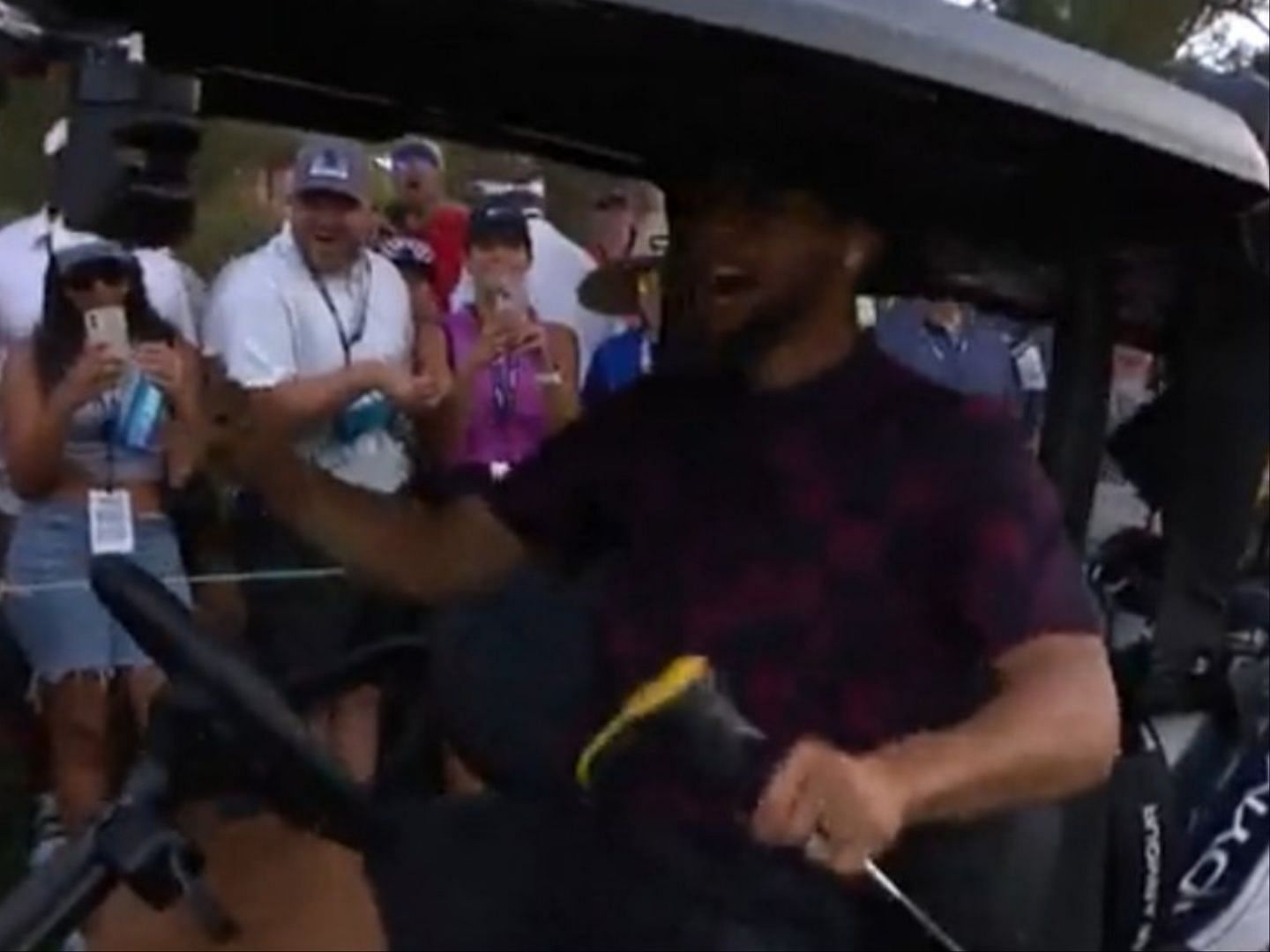 Steph Curry celebrates after winning their first hole in The Match. 