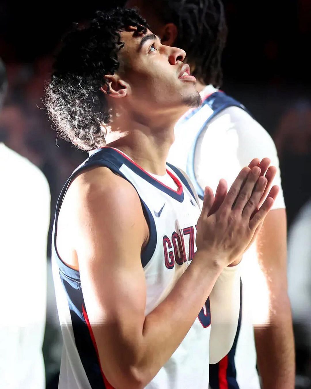 Julian Strawther praying before the tip off. Via Instagram