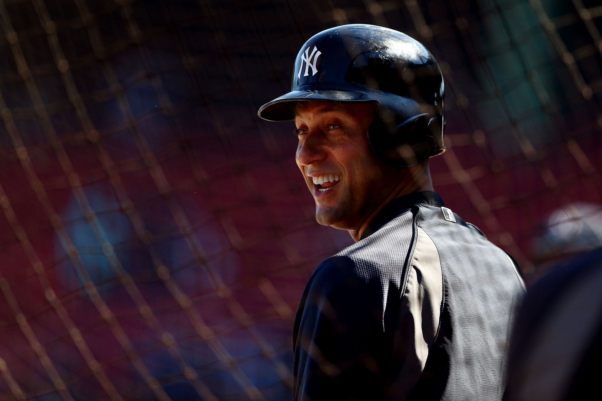 Derek Jeter takes a dive in the stands during the 12th inning