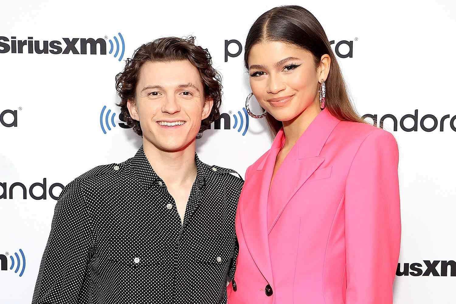 Off-screen chemistry: Tom Holland and zendaya, Hollywood&#039;s beloved couple, candidly captured at an event (Image via Getty Images)