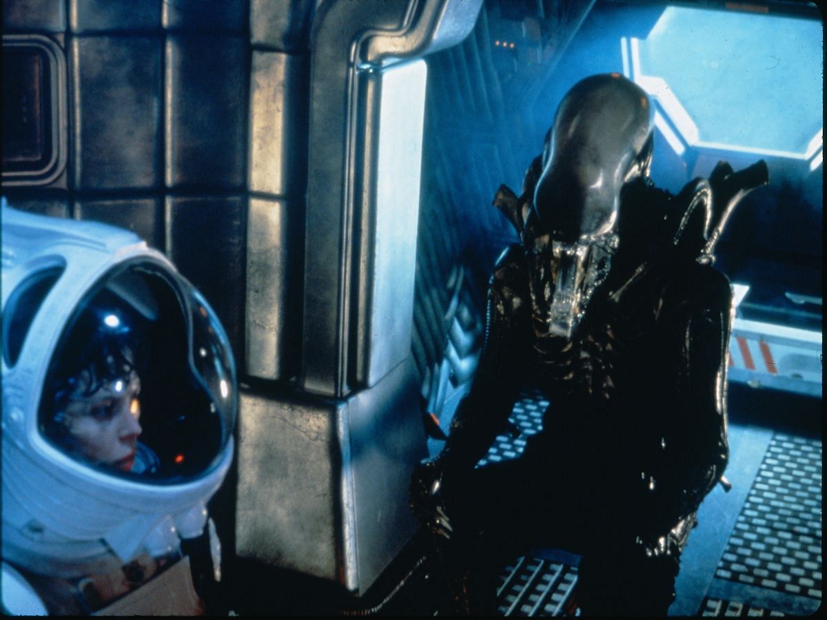 Sigourney Weaver, Bolaji Badejo, and Percy Edwards in Alien 1979 (Image via IMDb)