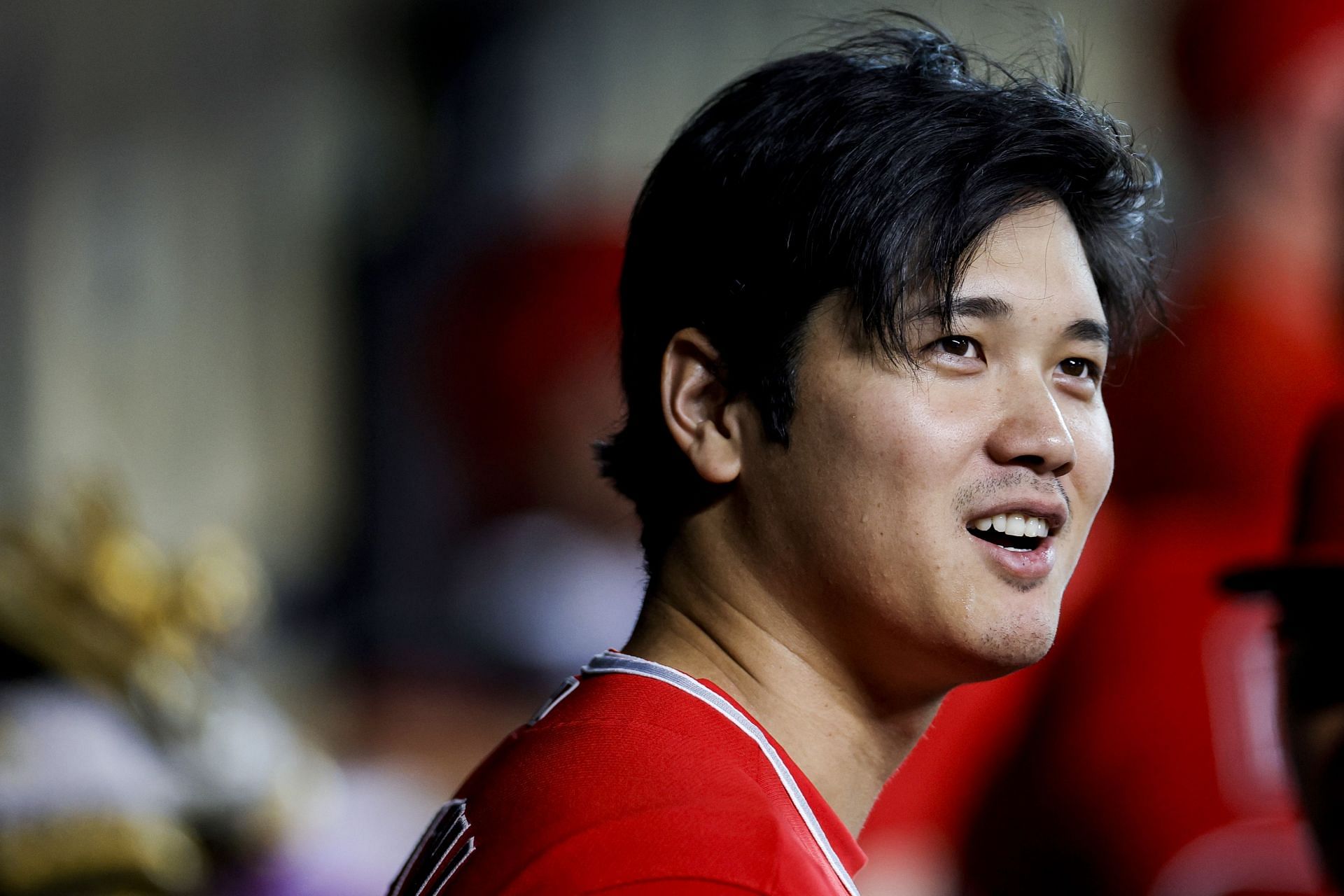 Shohei Ohtani interacts with teammates prior to facing the Houston Astros at Minute Maid Park