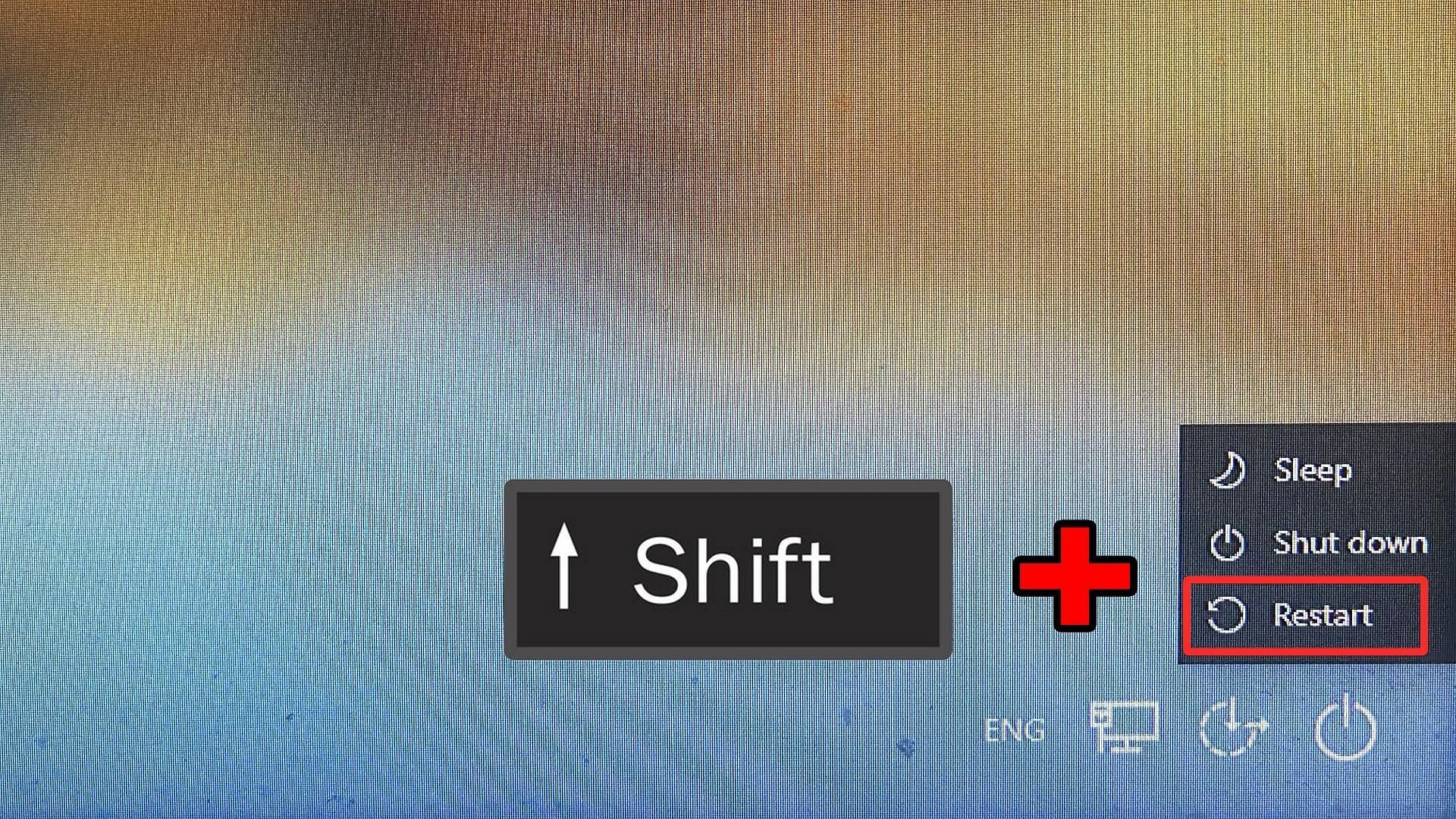 Press the Shift key and click on Restart (Image via Sportskeeda)