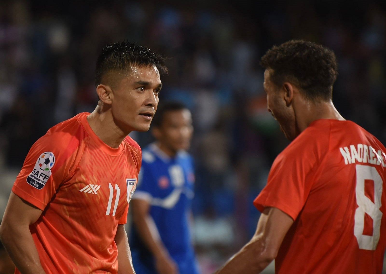 Sunil Chhetri celebrating his goal against Nepal with Naorem Mahesh Singh. 