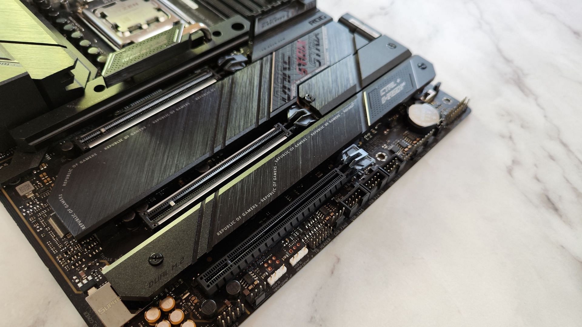 The three PCIe slots of the motherboard (Image via Sportskeeda)