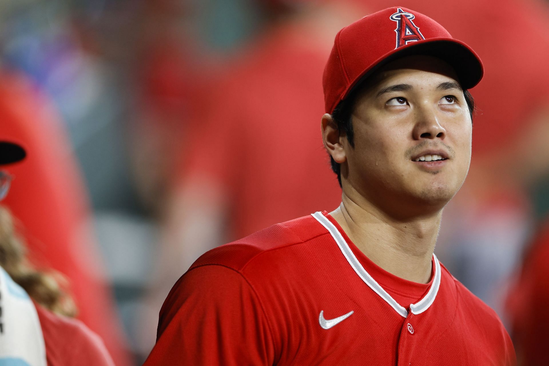 Shohei Ohtani of the Los Angeles Angels interacts with teammates prior to facing the Houston Astros at Minute Maid Park