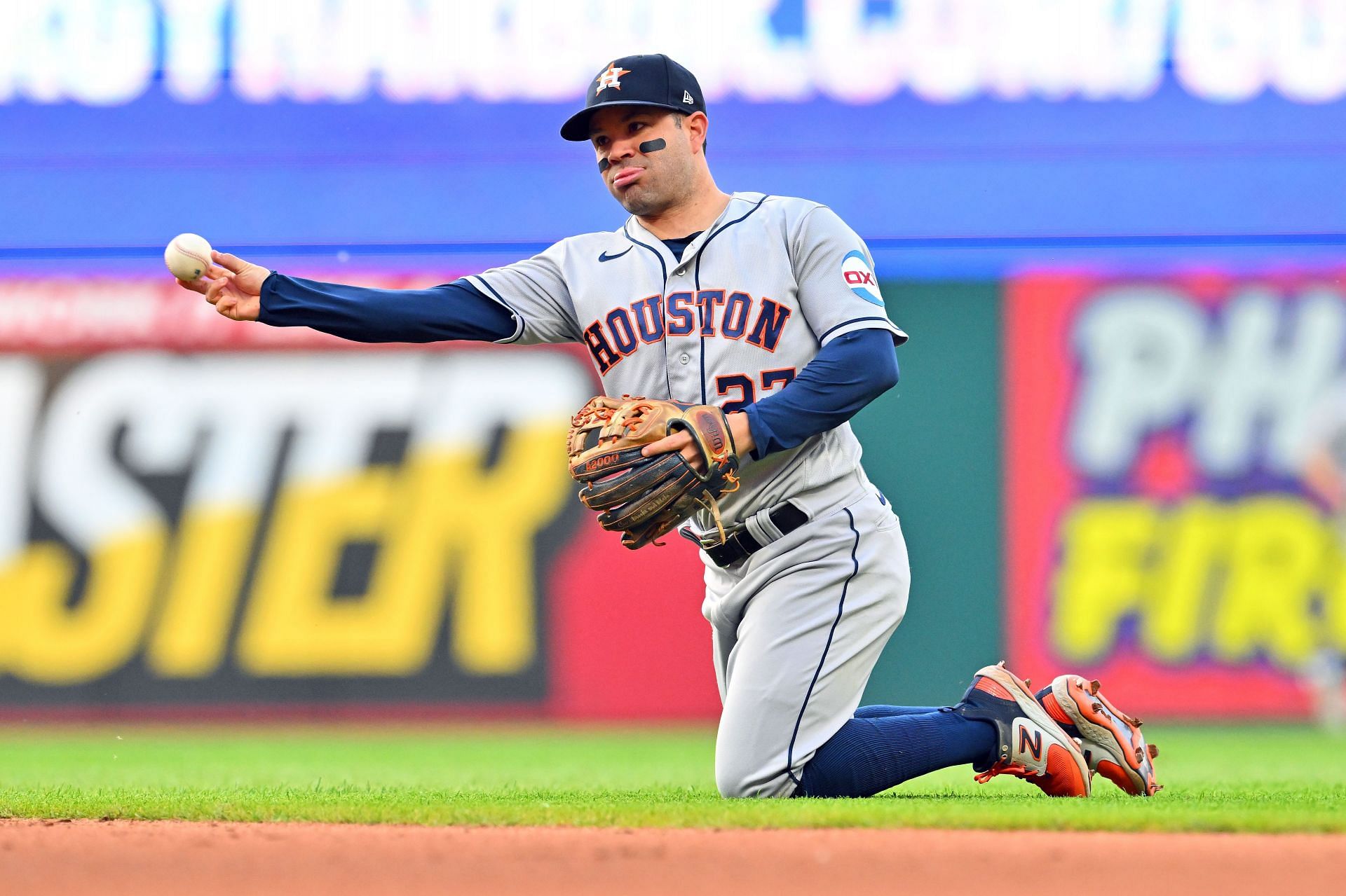 Second baseman Jose Altuve of the Houston Astros throws out Andres Gimenez at Progressive Field