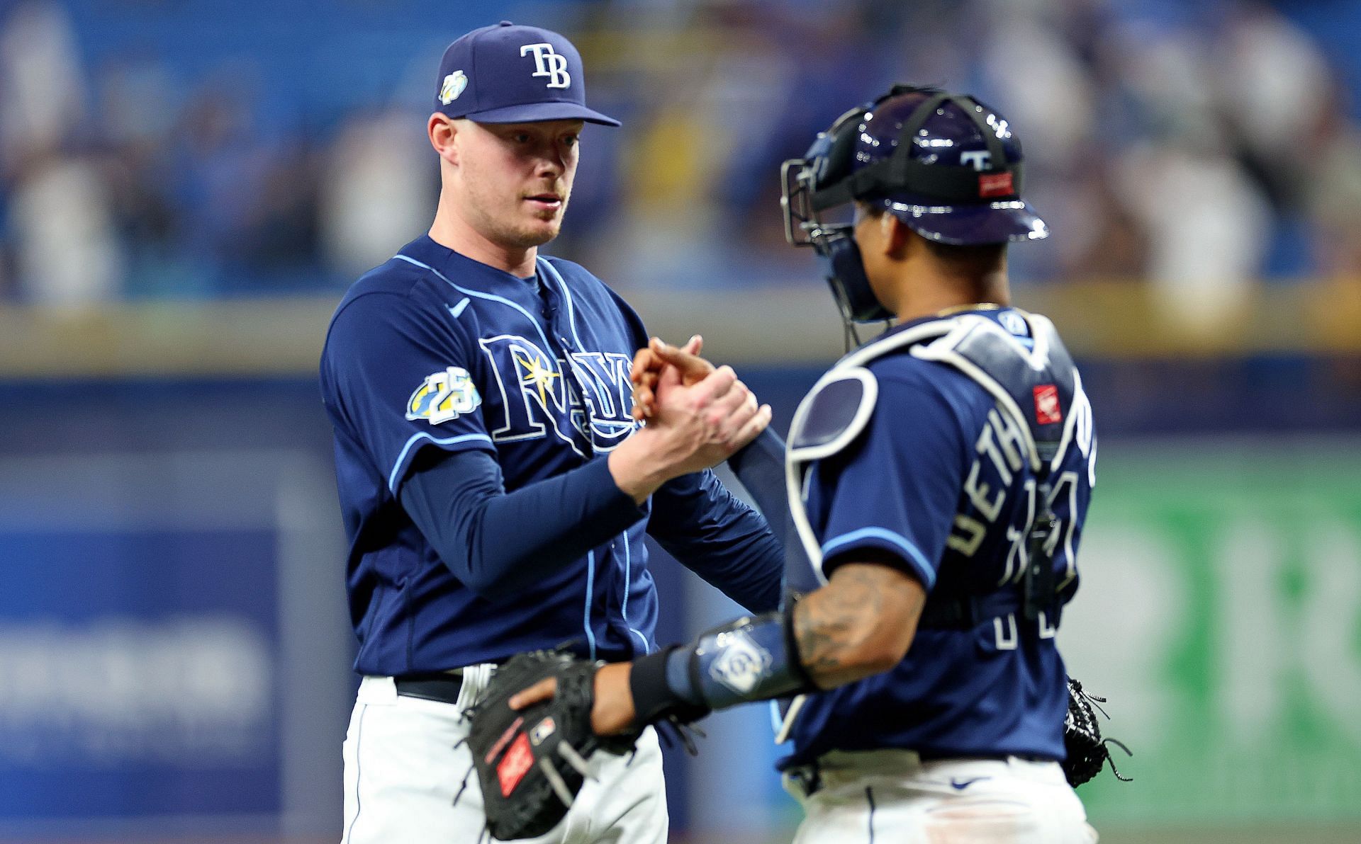 LOOK: Rays pitcher Pete Fairbanks gets black eye from dunking on 3-year-old  son in pool basketball 