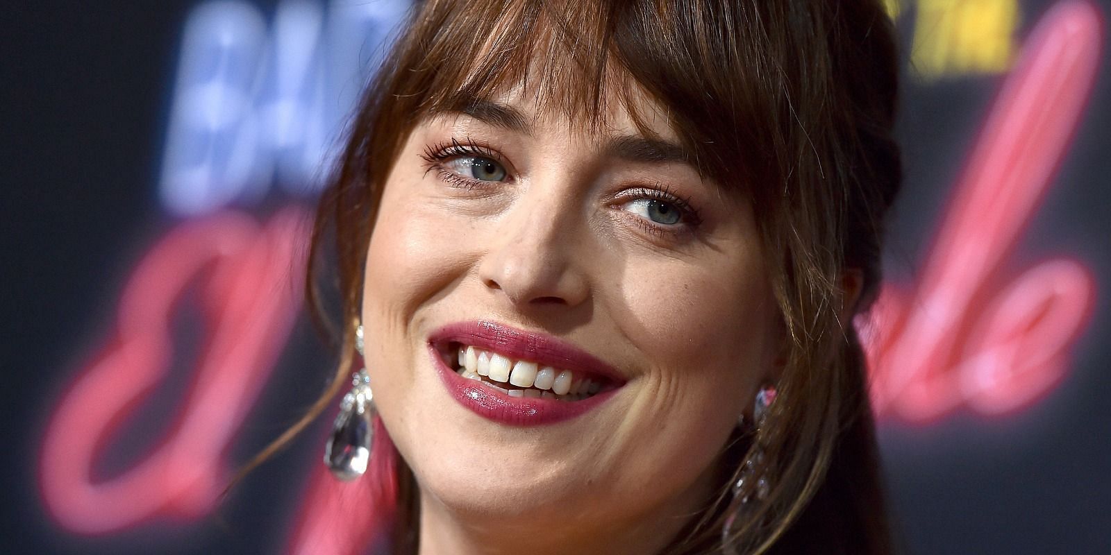 Dakota Johnson with her tooth gap (Image via Getty Images)