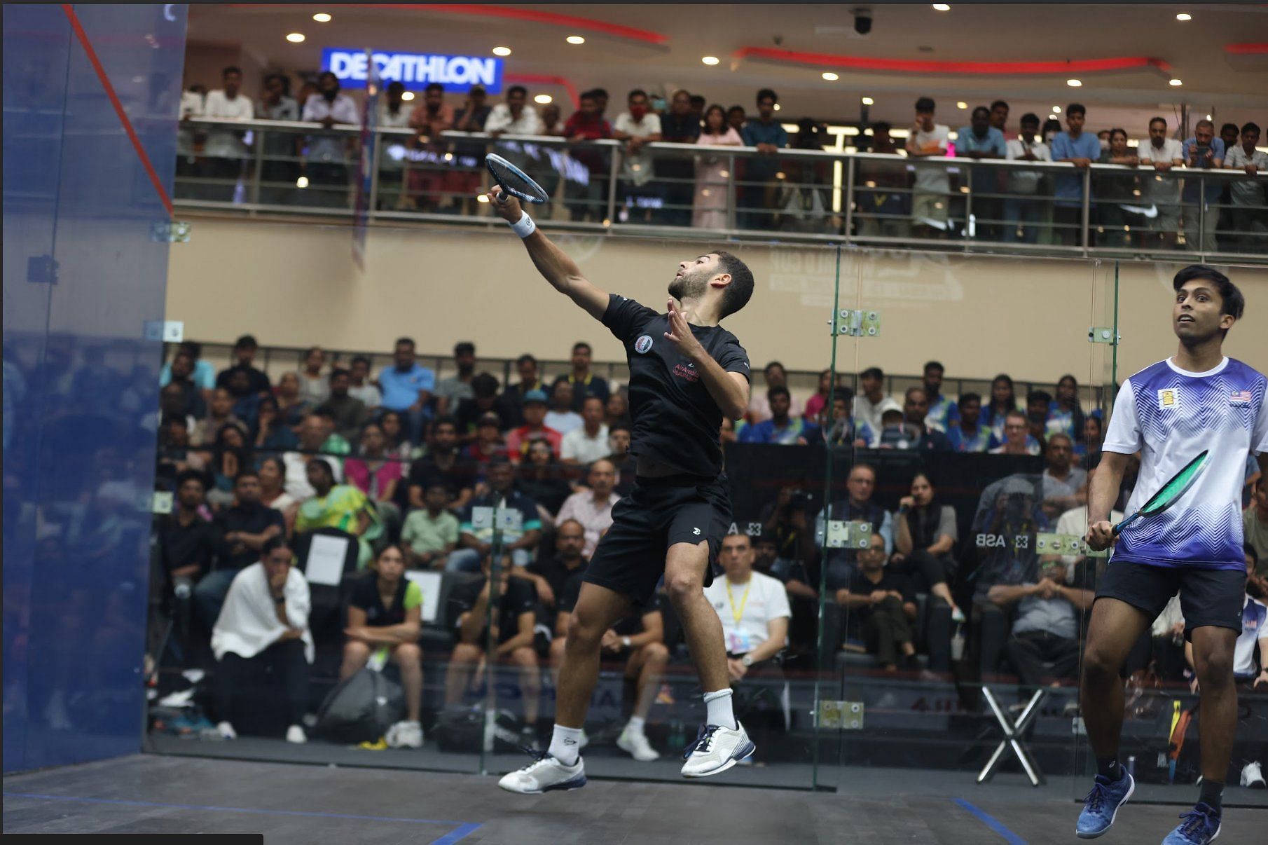 Darren Pragasam in action against Egypt's Aly Abou Eleinen (PC: Twitter/World Squash)