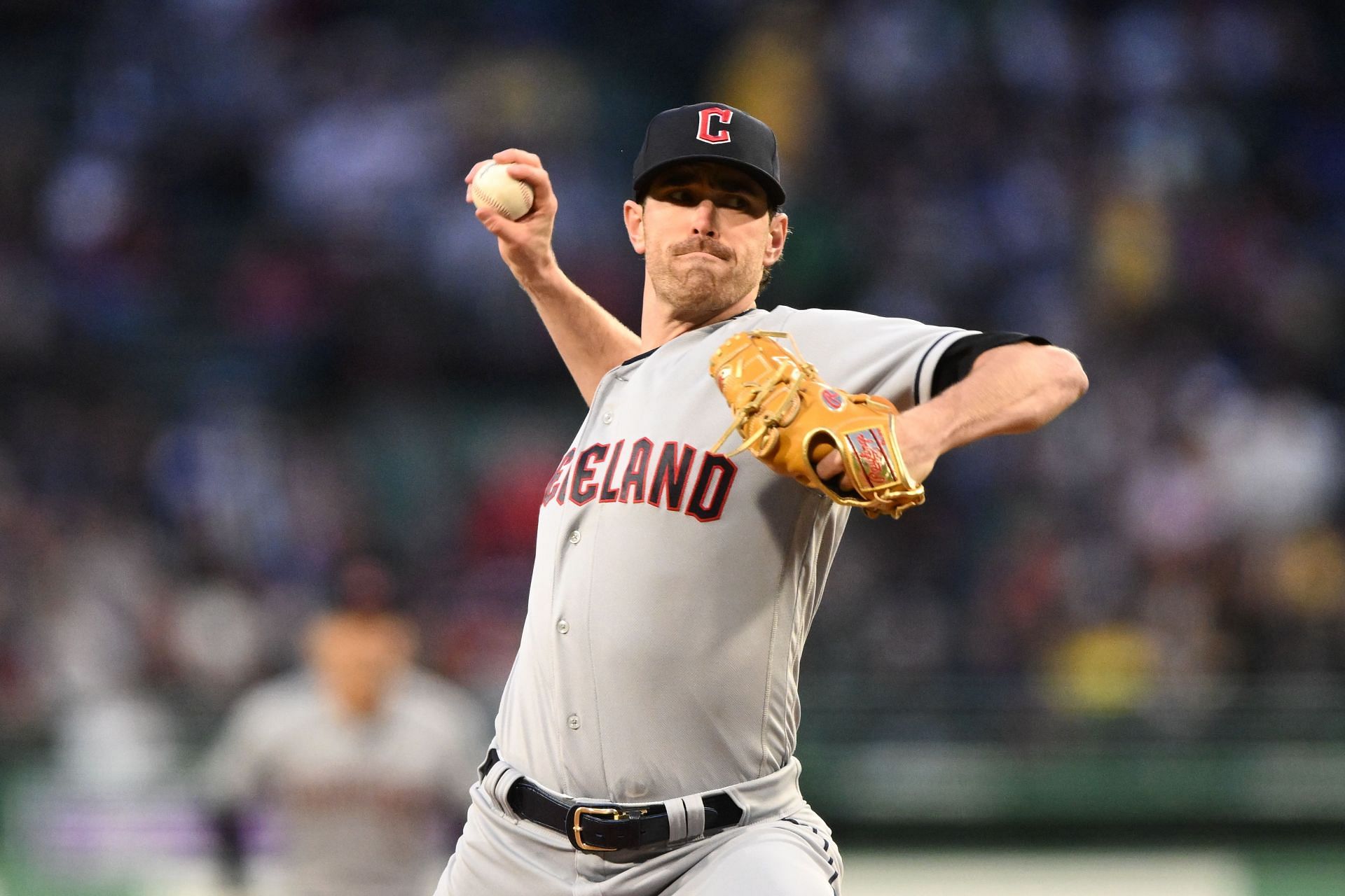 Shane Bieber of the Cleveland Guardians pitches against the Boston Red Sox at Fenway Park