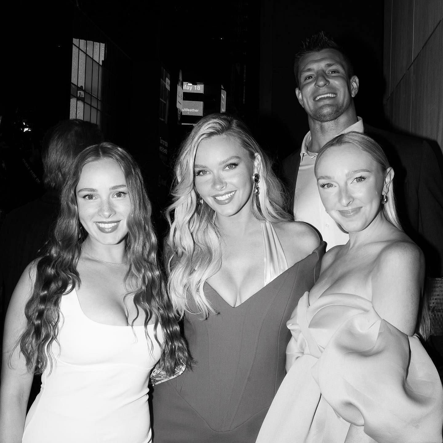 Rob Gronkowski and the Kostek sisters Camille, Alina, and Julia at the 2023 Sports Illustrated Swimsuit Issue launch party - image via IG/@camillekostek