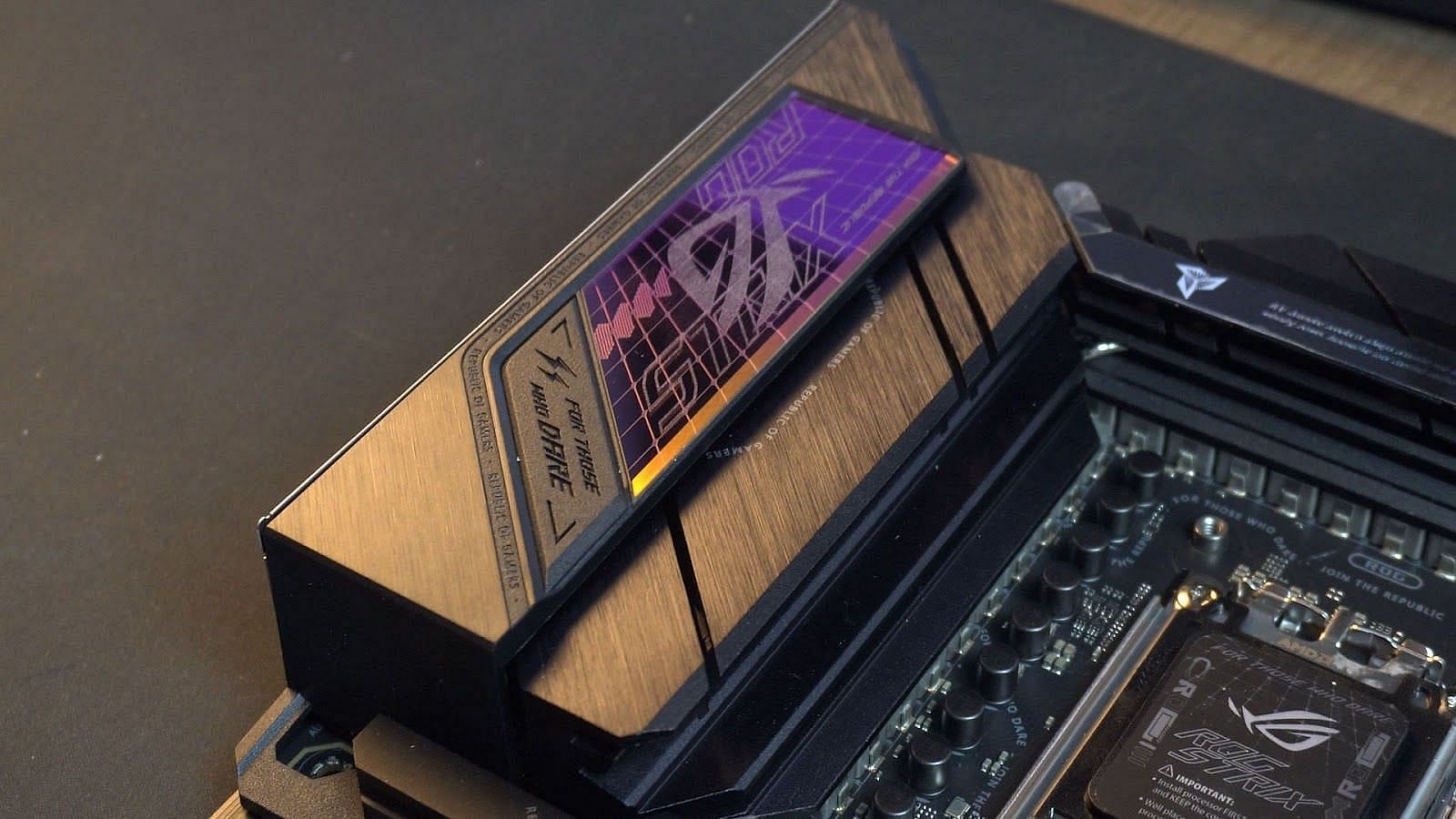 The stylish back cover of the ASUS ROG Strix X670E (Image via Sportskeeda)