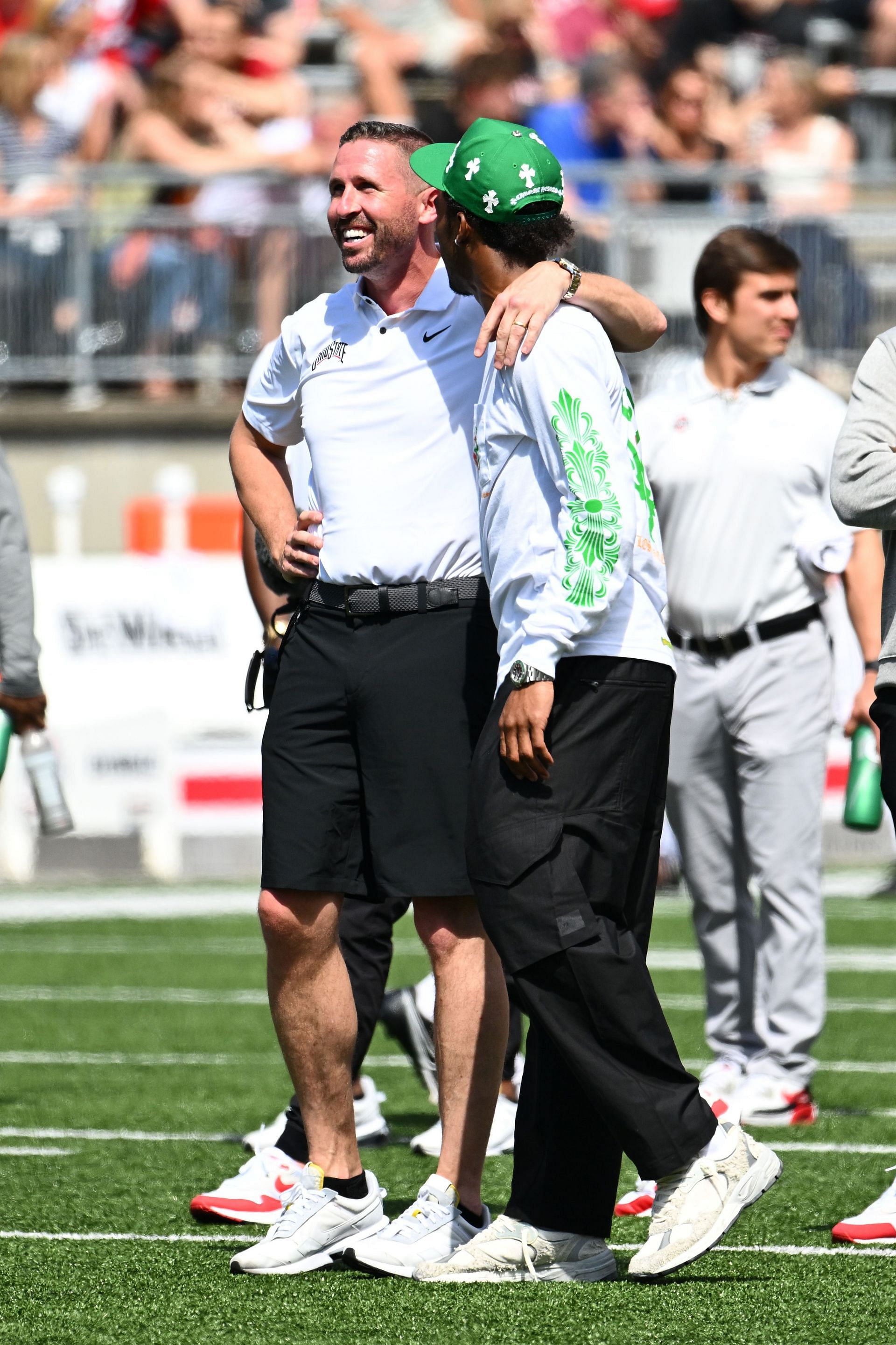 Brian Hartline (left) with a recruit