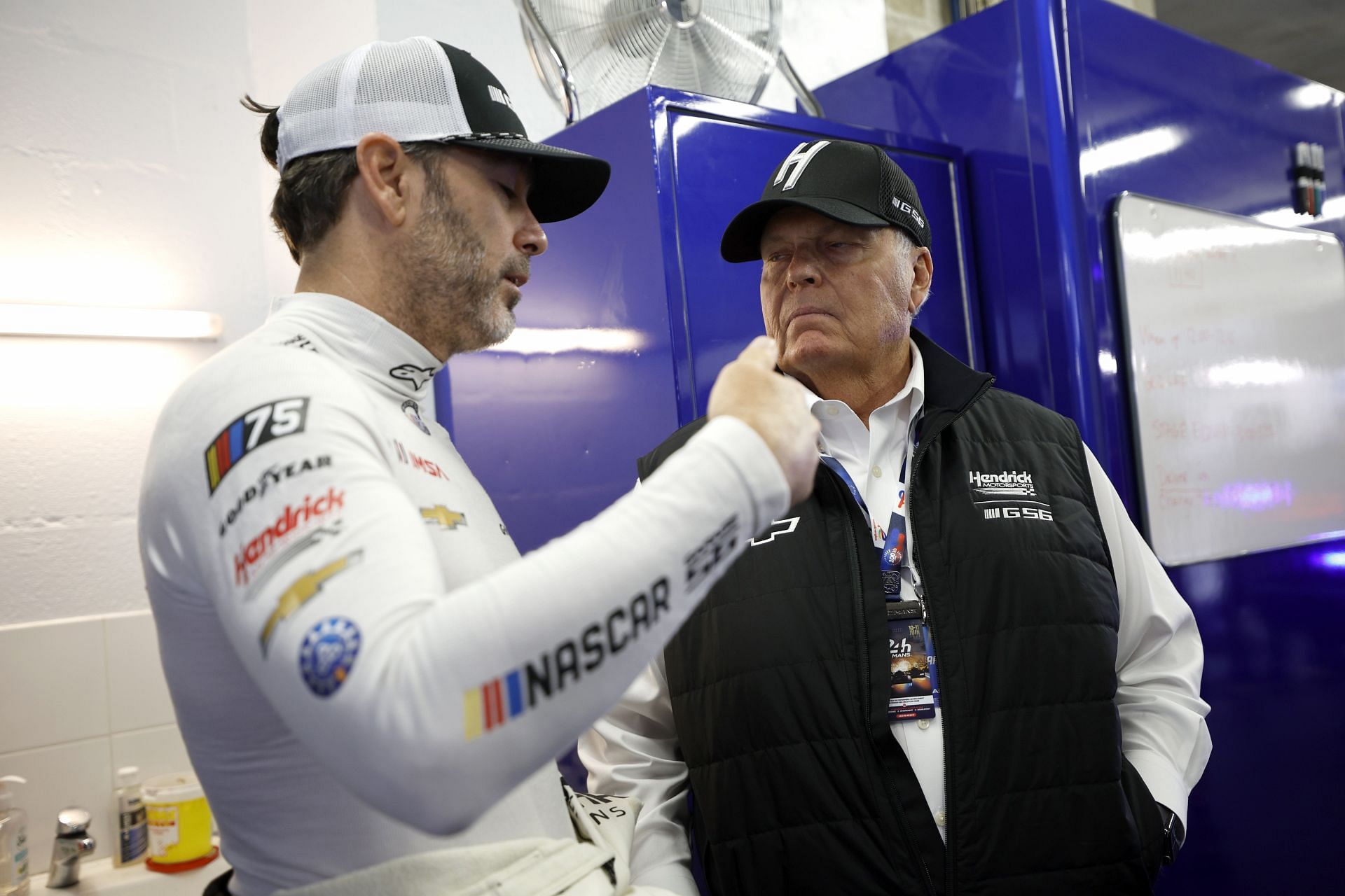 Jimmie Johnson talks with team owner Rick Hendrick ahead of 24 Hours of Le Mans