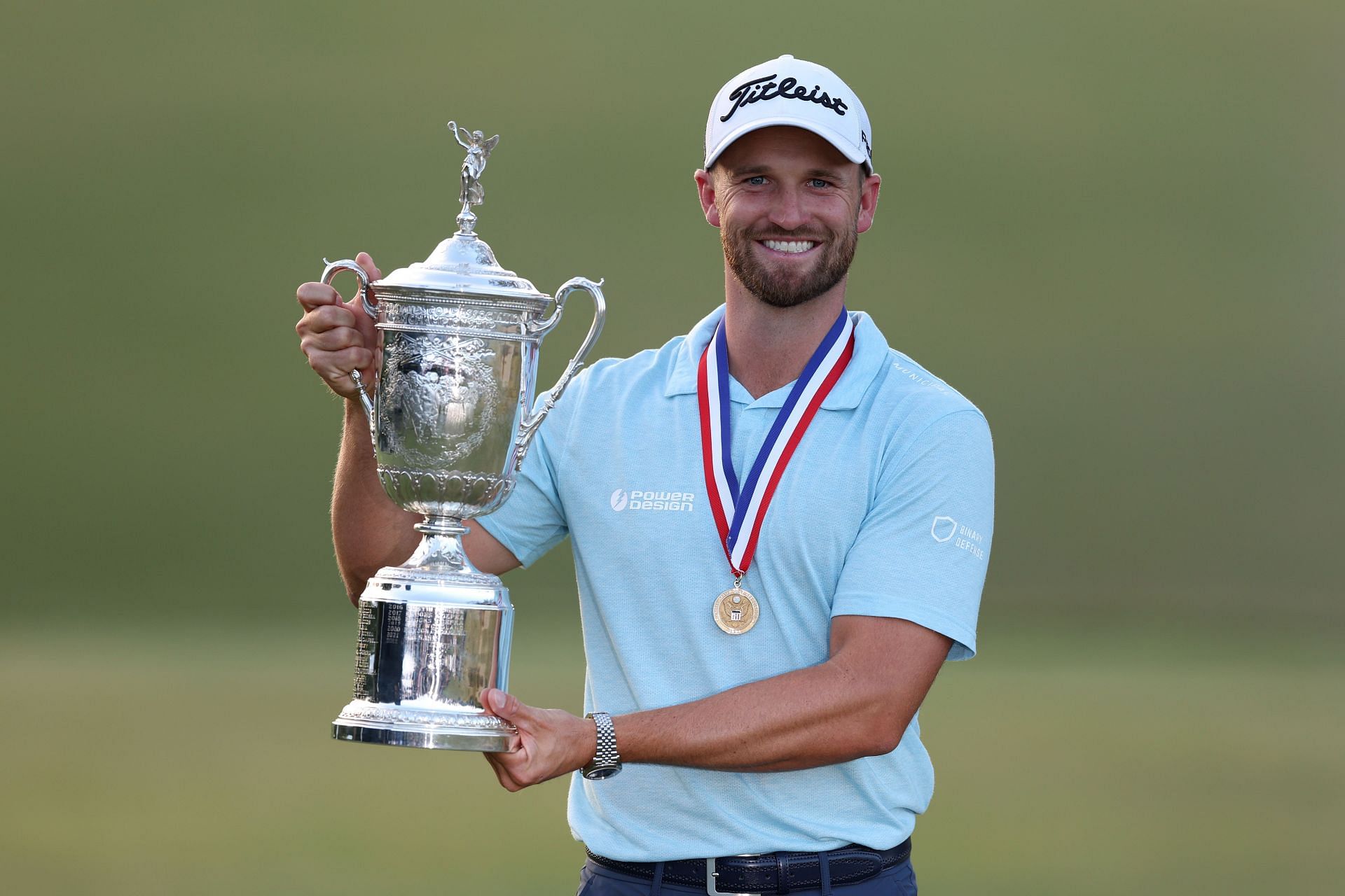 Wyndham Clark poses with the trophy and medal after winning the 123rd US Open Championship