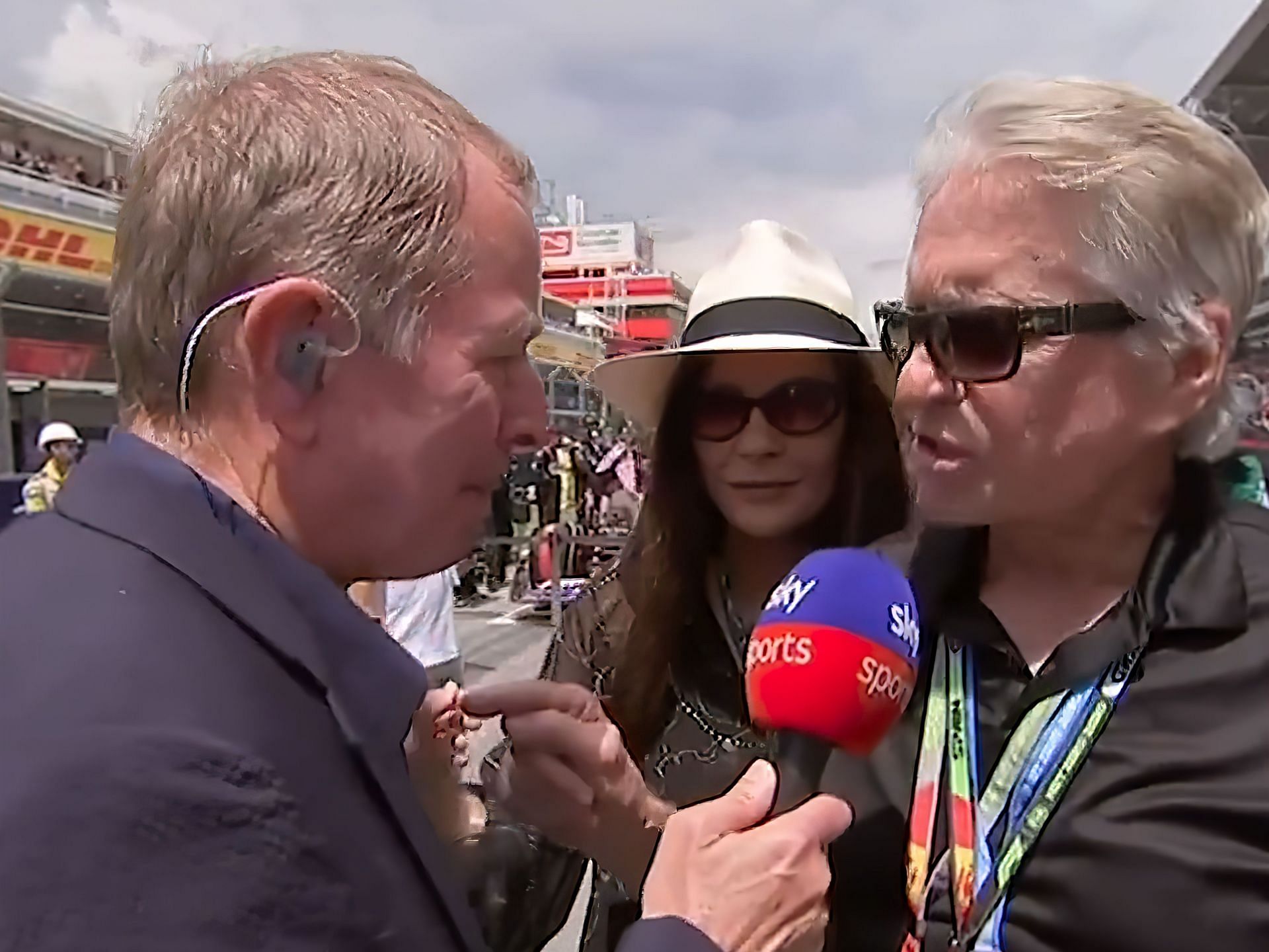 Martin Brundle talking to Michael Douglas and Catherine Zeta-Jones prior to the 2023 F1 Spanish Grand Prix (Image via Sportskeeda)