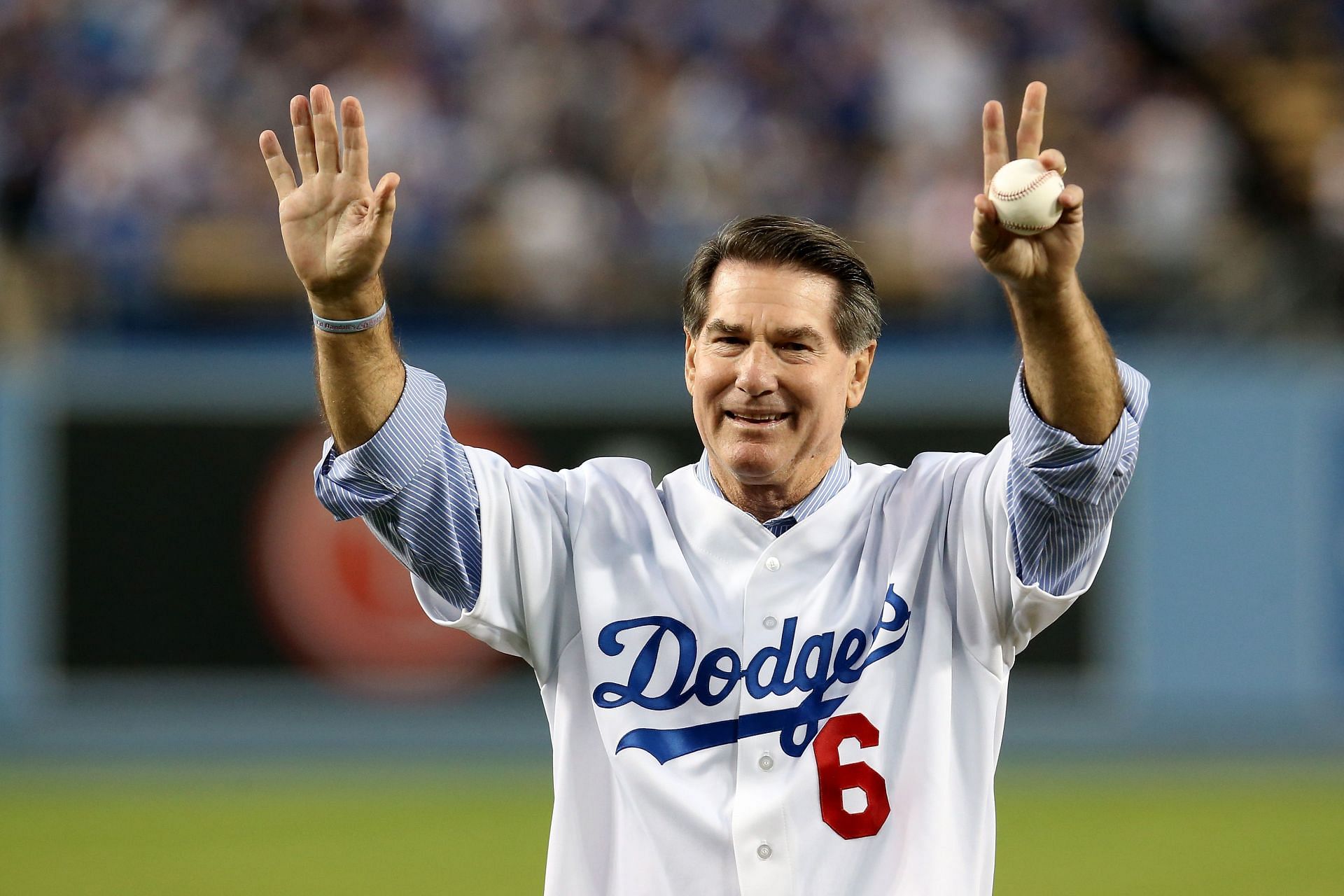 Los Angeles Dodgers legend Steve Garvey throws out a ceremonial first pitch before the Dodgers take on the Atlanta Braves in Game Four of the National League Division Series at Dodger Stadium on October 7, 2013 in Los Angeles, California. (Photo by Stephen Dunn/Getty Images)