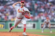 Adam Wainwright of the St. Louis Cardinals throws against the Boston Red Sox.