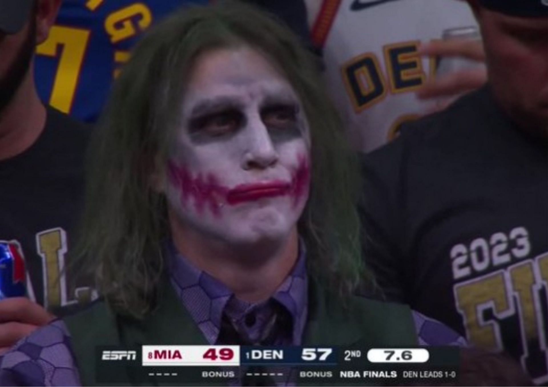 A Denver Nuggets fan dressed as &quot;The Joker&quot; watched his team rally in the first half against the Miami Heat.