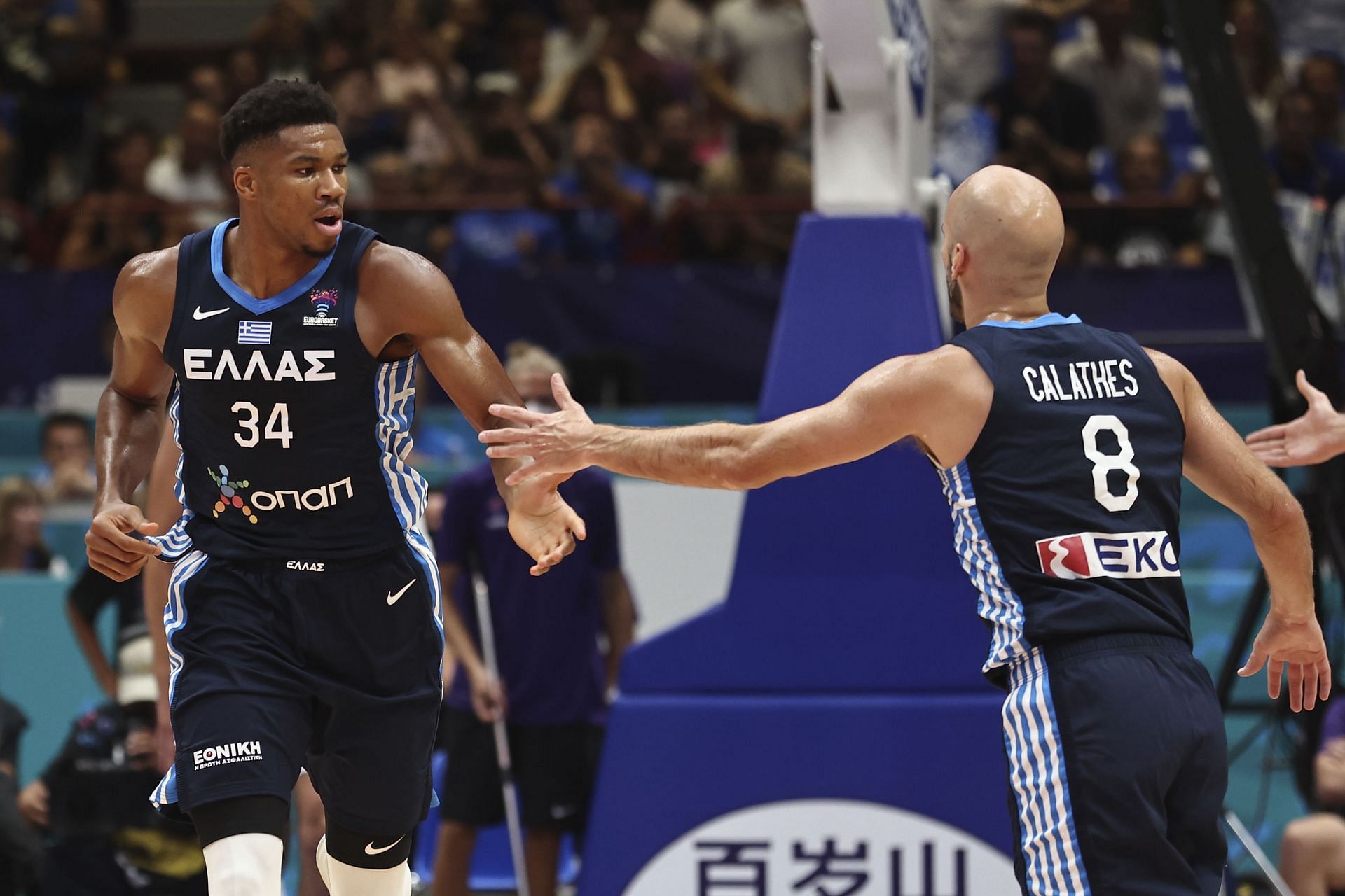 Giannis Antetokounmpo (lefT) and Nick Calathes of Greece