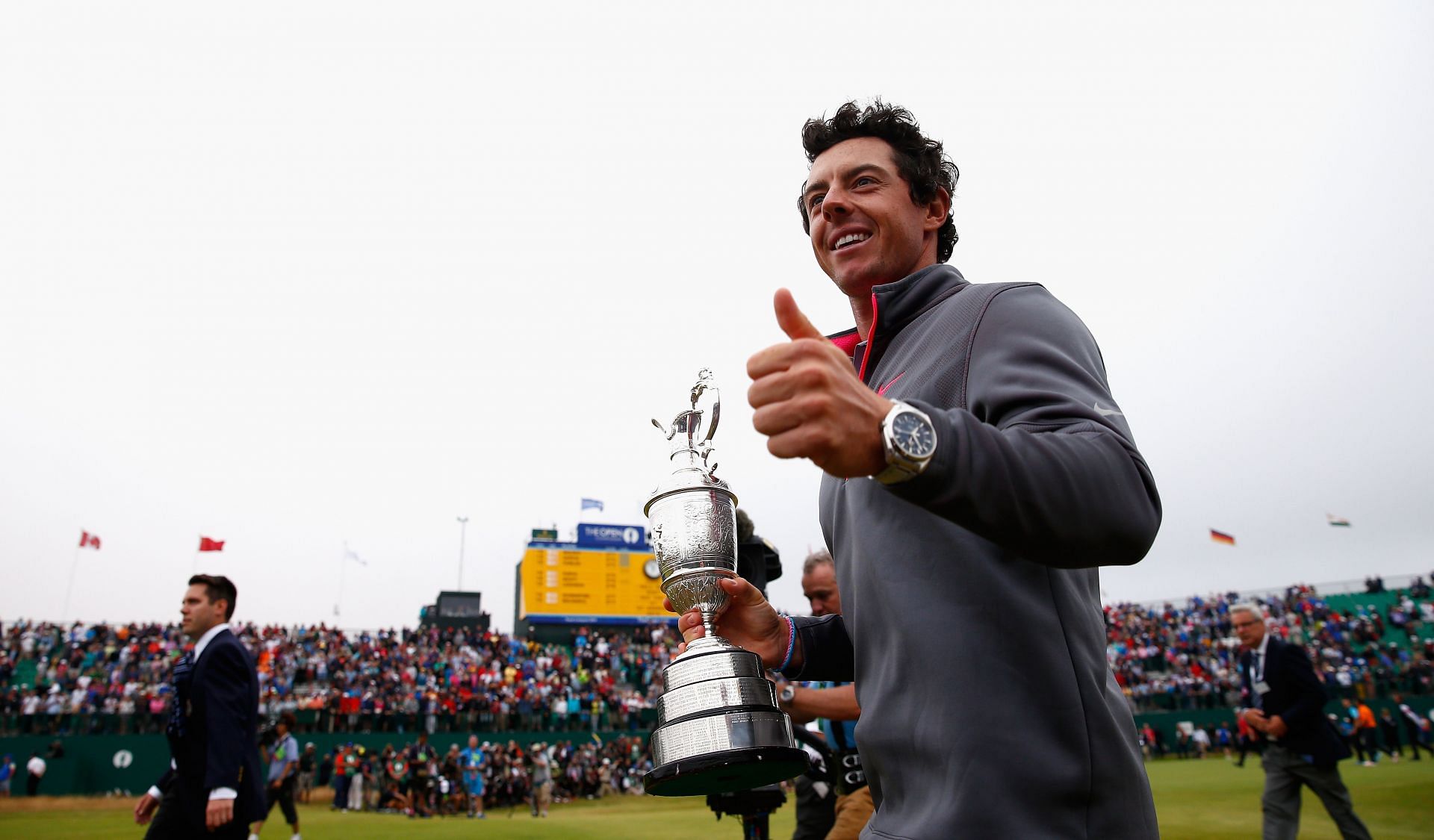 Rory McIlroy with The Open 2014 Trophy (via Getty Images)