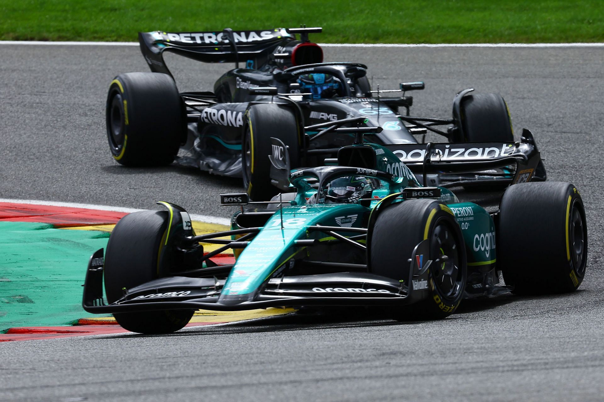 Lance Stroll (Aston Martin) and George Russell (Mercedes) during the Belgian Grand Prix (Photo by Mark Thompson/Getty Images)