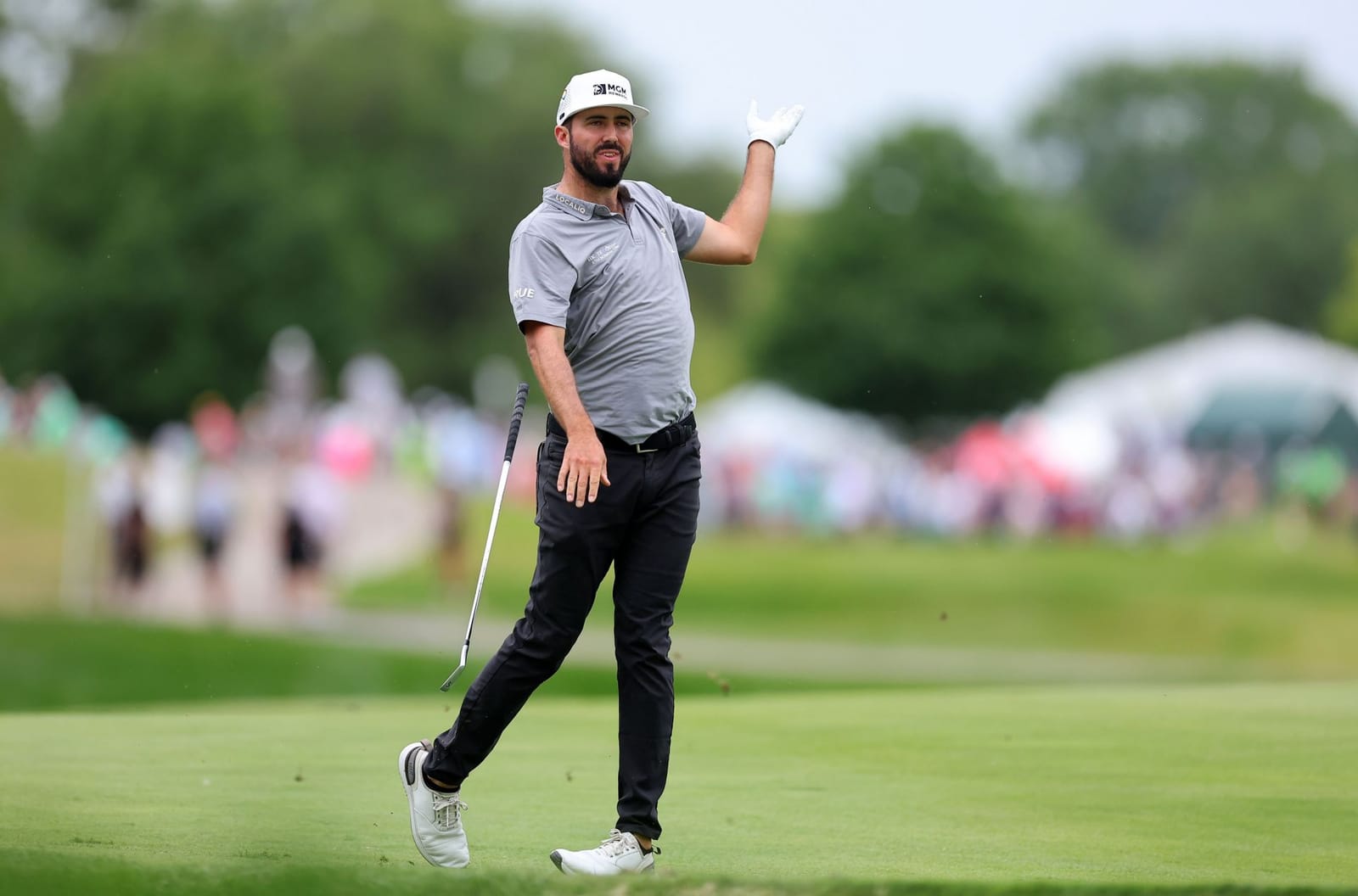 Watch Mark Hubbard flips his caddie off after holing out from the