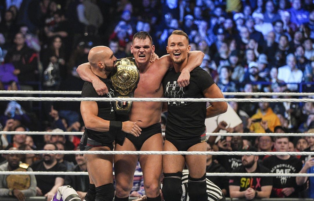 Gunther with Imperium after a WWE Intercontinental Championship match.