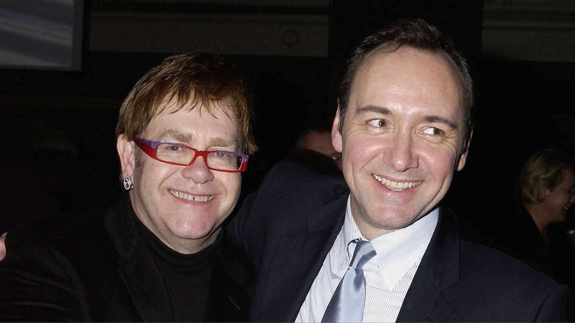 Sir Elton John and Kevin Spacey pictured together at the Nordoff Robbins Music Therapy Charity Dinner in 2005. (Image via Dave Bennet/Getty Images)