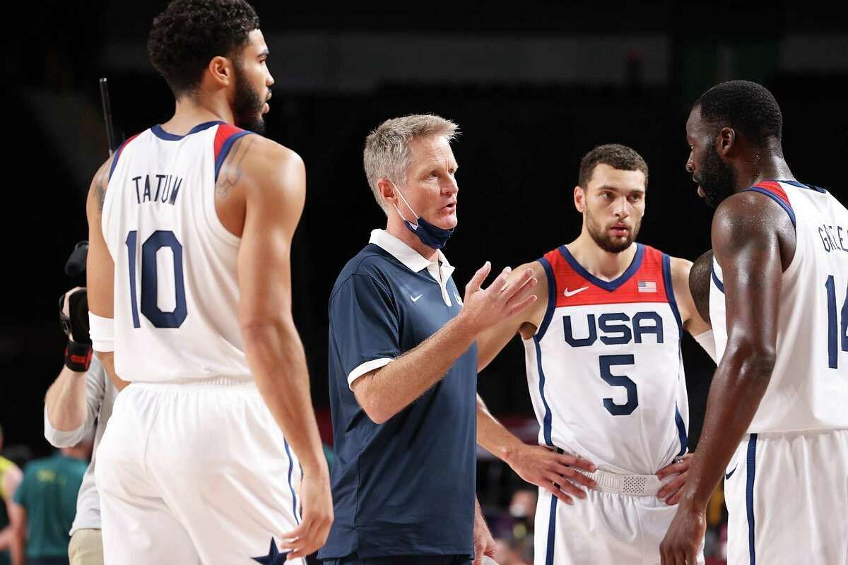 Team United States Assistant Coach Steve Kerr speaks with Draymond Green #14 during the second half of a Men