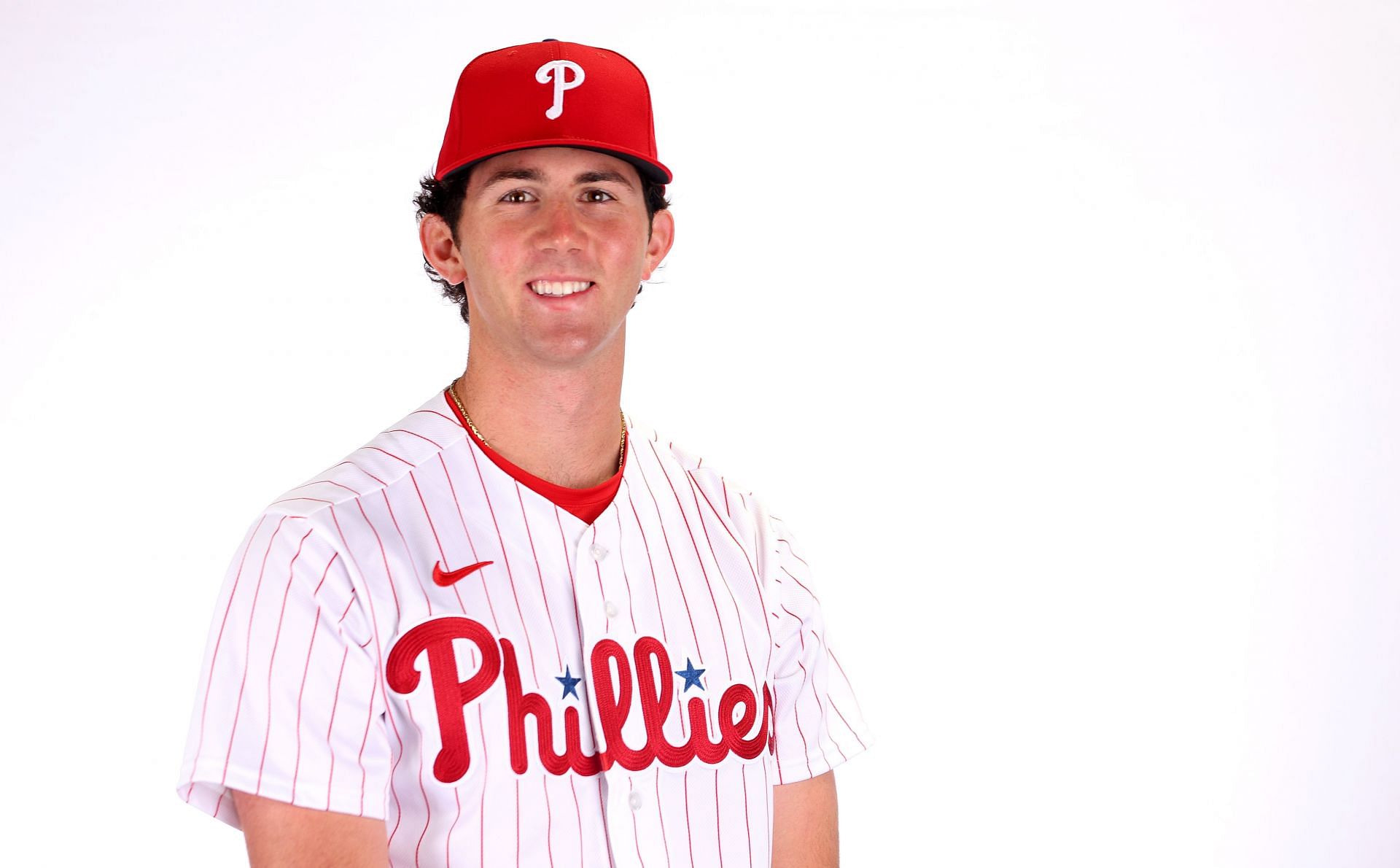 Pitcher Andrew Painter of the Philadelphia Phillies poses for a portrait during media day at BayCare Ballpark