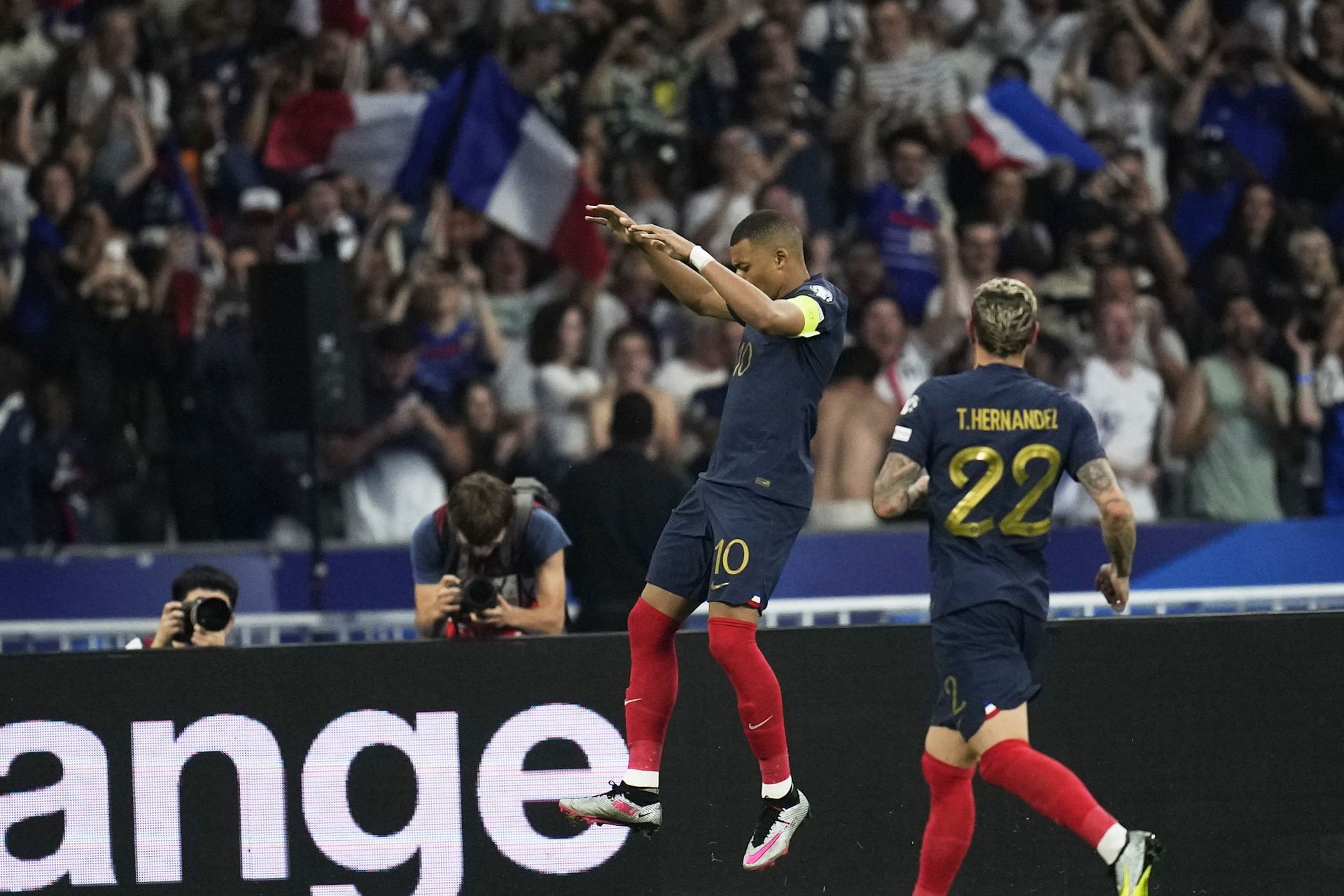 Kylian Mbappe, who is renowned for his pace, celebrates after scoring for France.