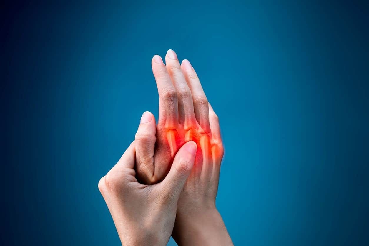 Pain experienced in the joints (Image via Getty Images)