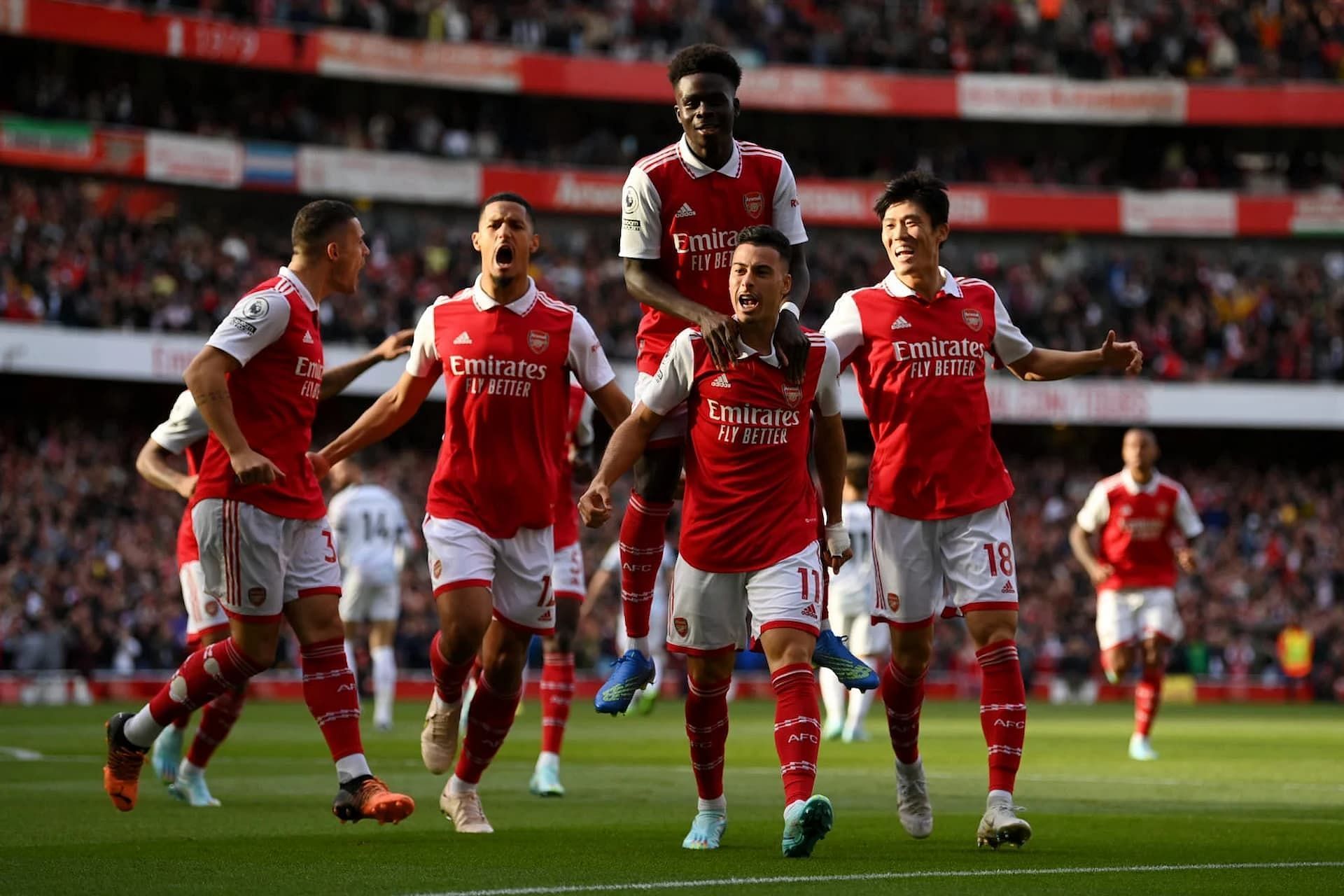 Arsenal celebrating a goal during the season (Image via Getty)