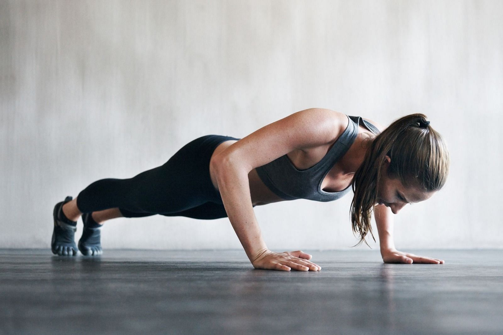 Push-ups in a workout (Image via Getty Images)
