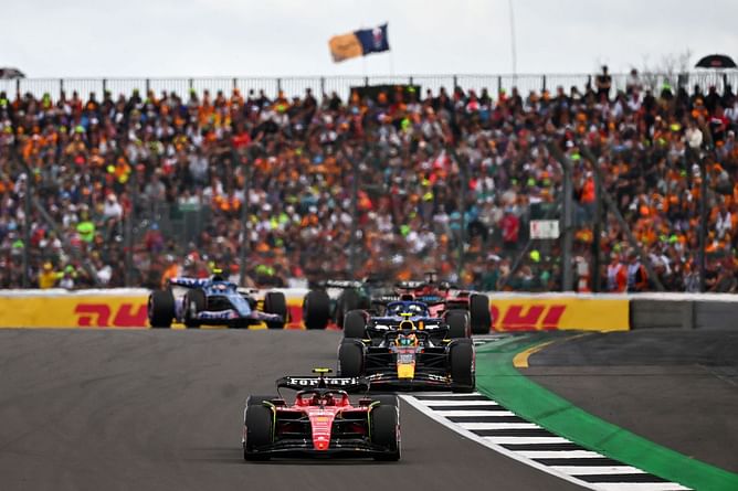 WATCH: Carlos Sainz loses 3 positions within 3 corners to Sergio Perez, Alex Albon, and Charles Leclerc at the 2023 F1 British GP