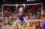 Olivia Dunne of LSU warms up on the uneven bars during a gymnastics meet