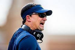 Neal Brown addresses the Big 12's preseason poll debacle in West Virginia and his ruined vacation ahead of the 2023 season