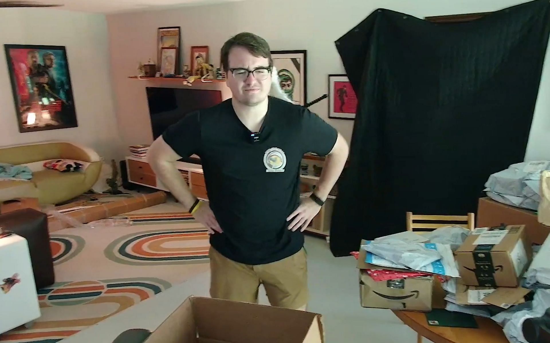 Twitch streamer General Sam shows an item sent by a viewer on his livestream (Image via General Sam/Twitch)