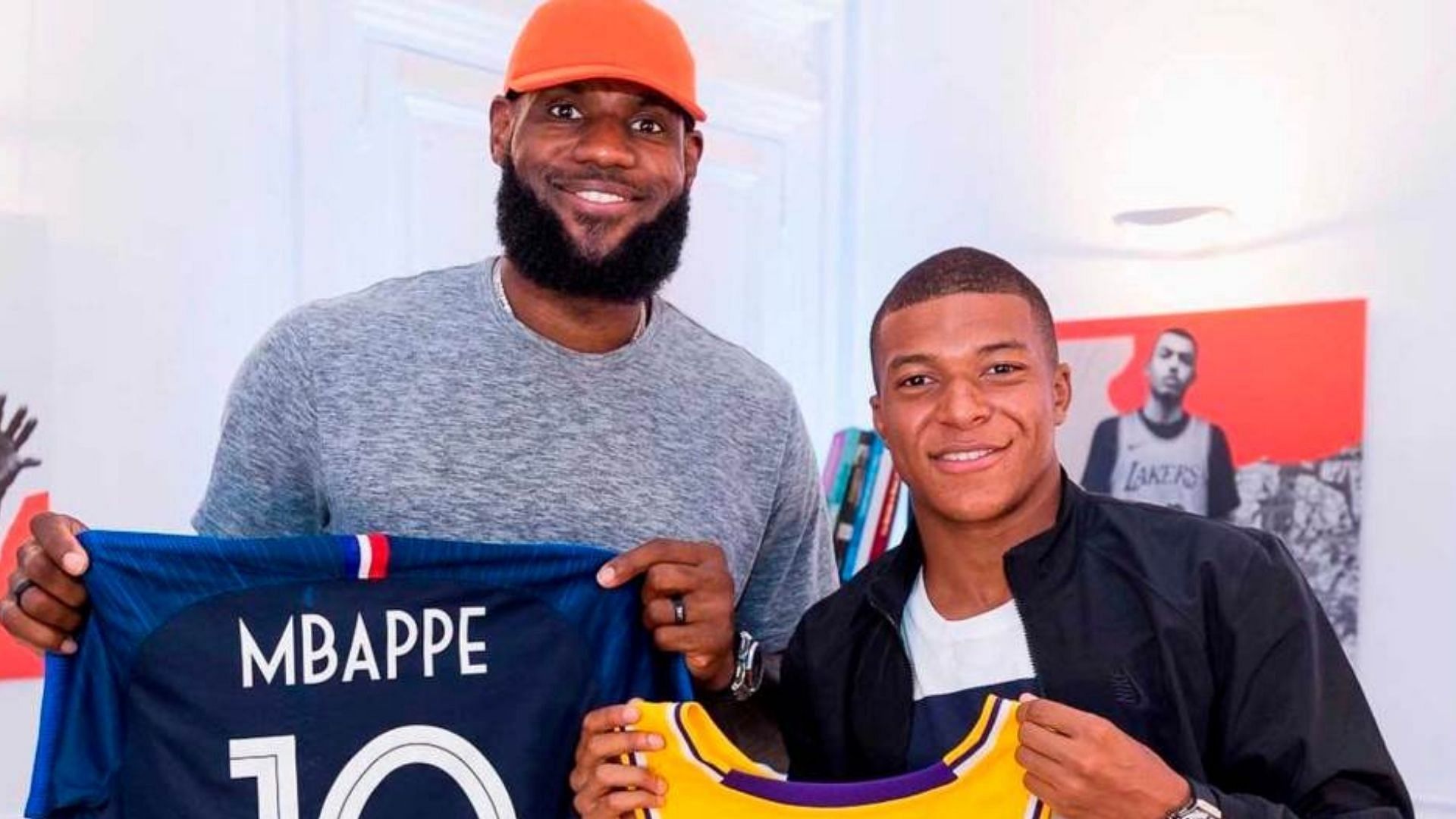 LeBron James of the LA Lakers and Kylian Mbappe of PSG exchanging their jerseys