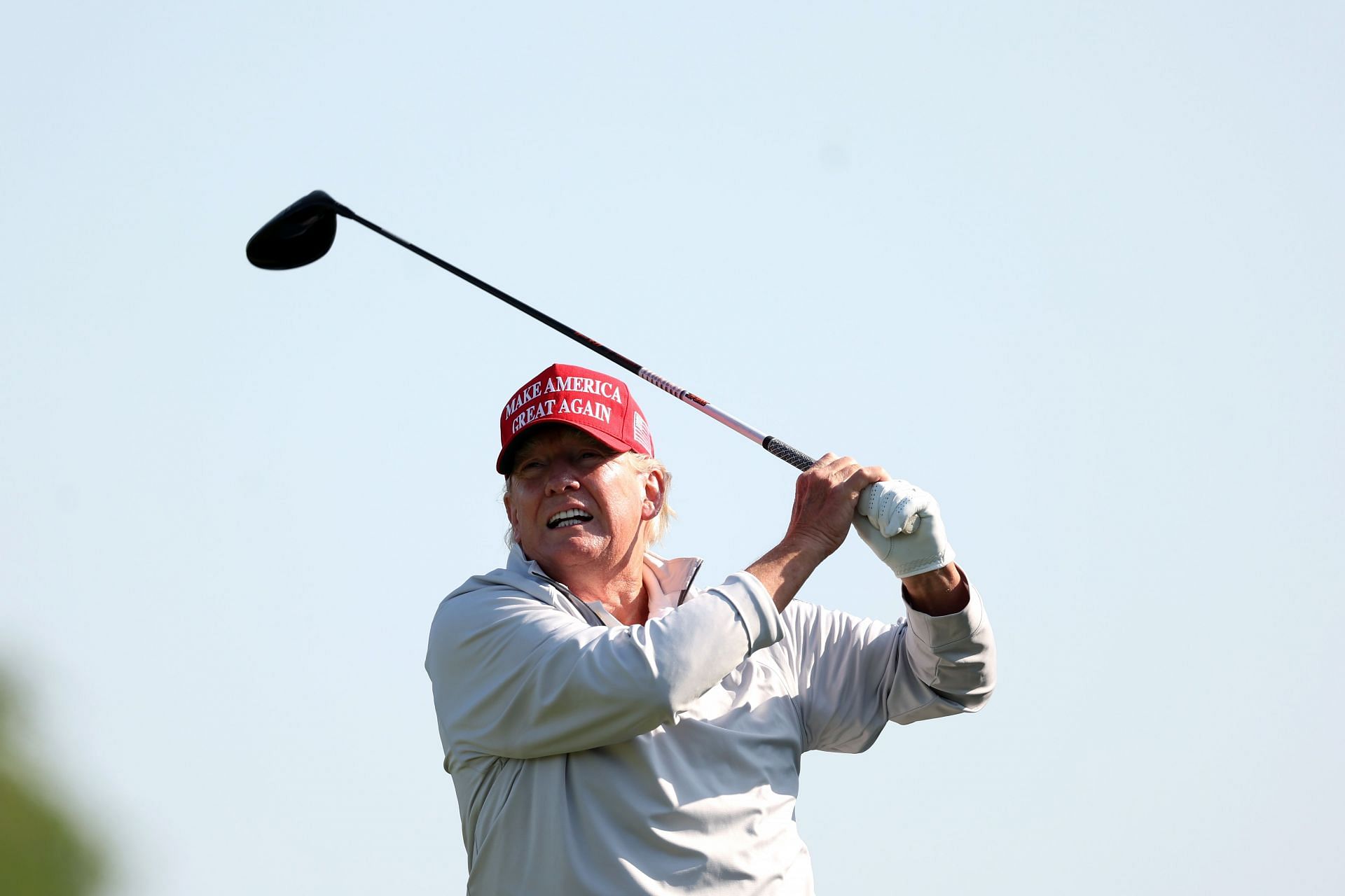 Donald Trump hits the tee shot during LIV Golf Invitational, DC Pro-Am