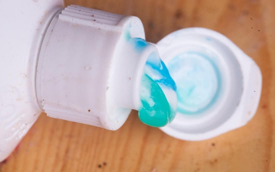 Toothpaste on pimple (Image via Getty Images)