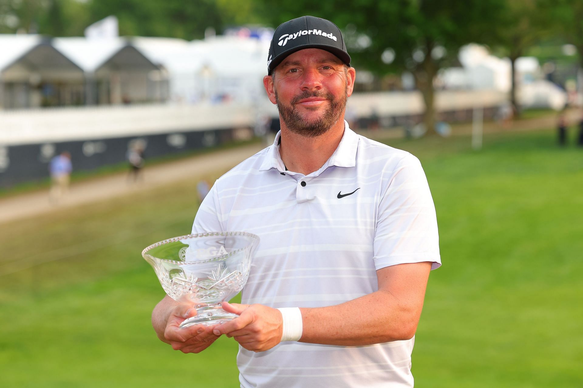 Michael Block with Low Club professional trophy at the 2023 PGA Championship (via Getty Images)