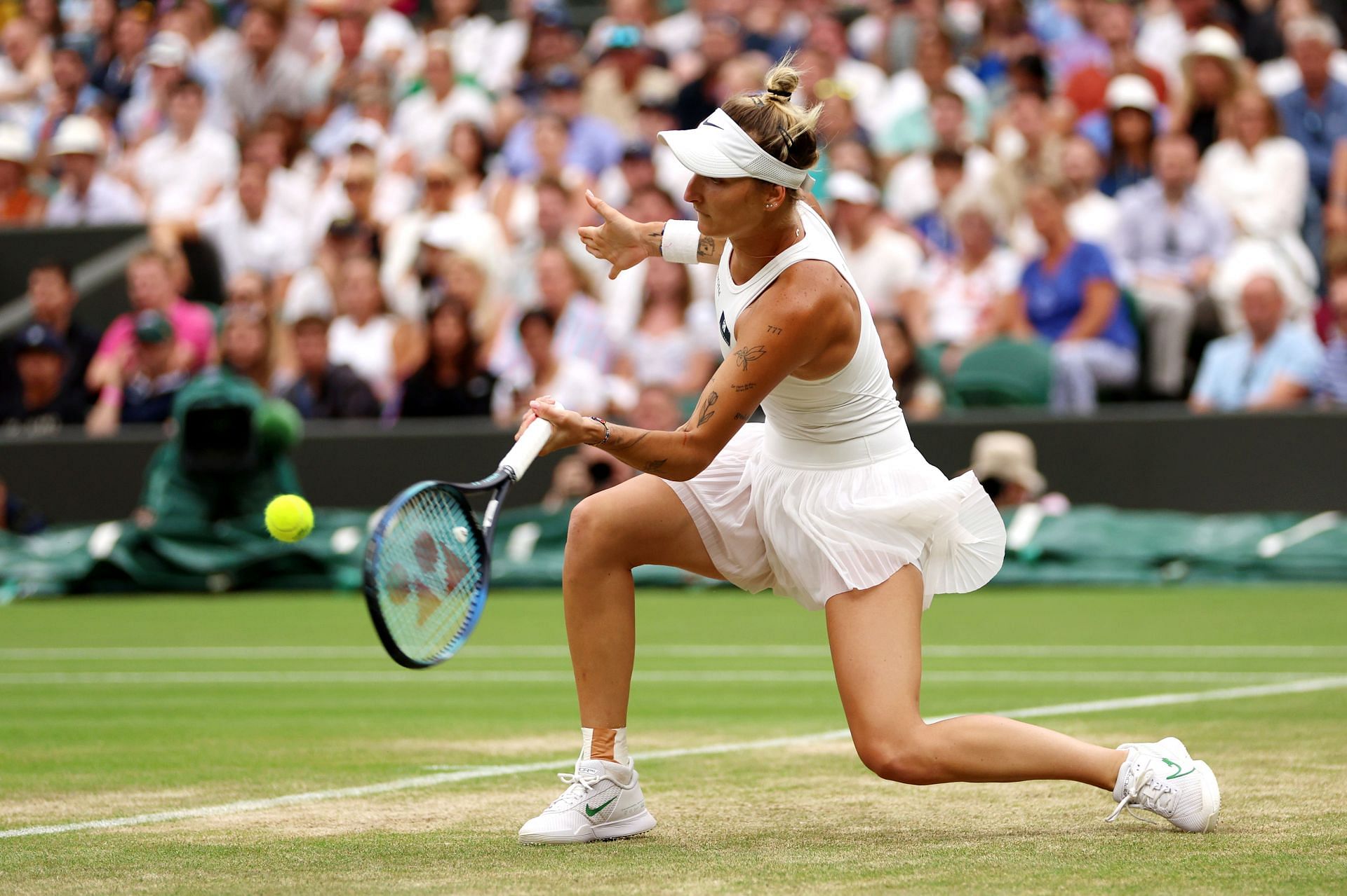 Marketa Vondrousova plays a forehand in the quarterfinals of Wimbledon 2023
