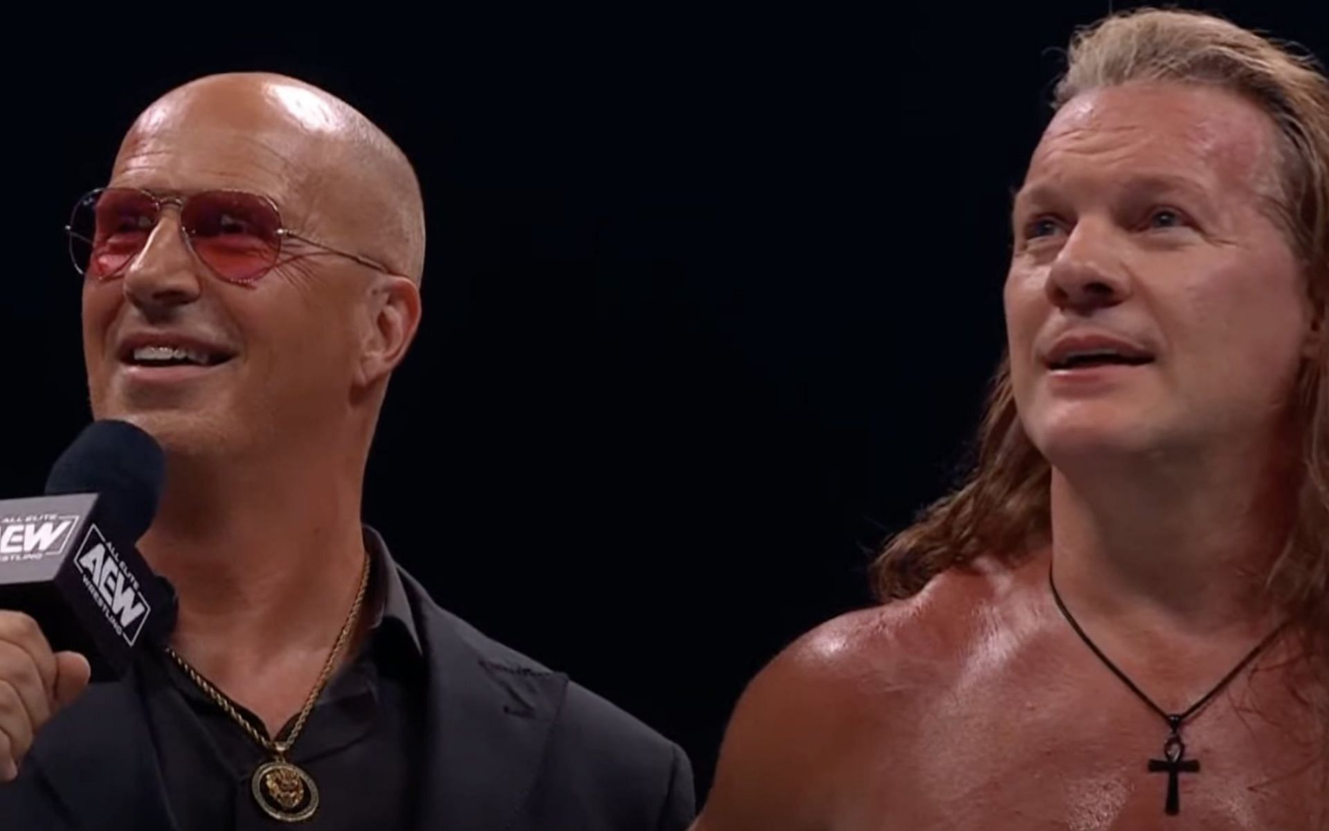 Don Callis trying to convince Chris Jericho to join him against The Elite